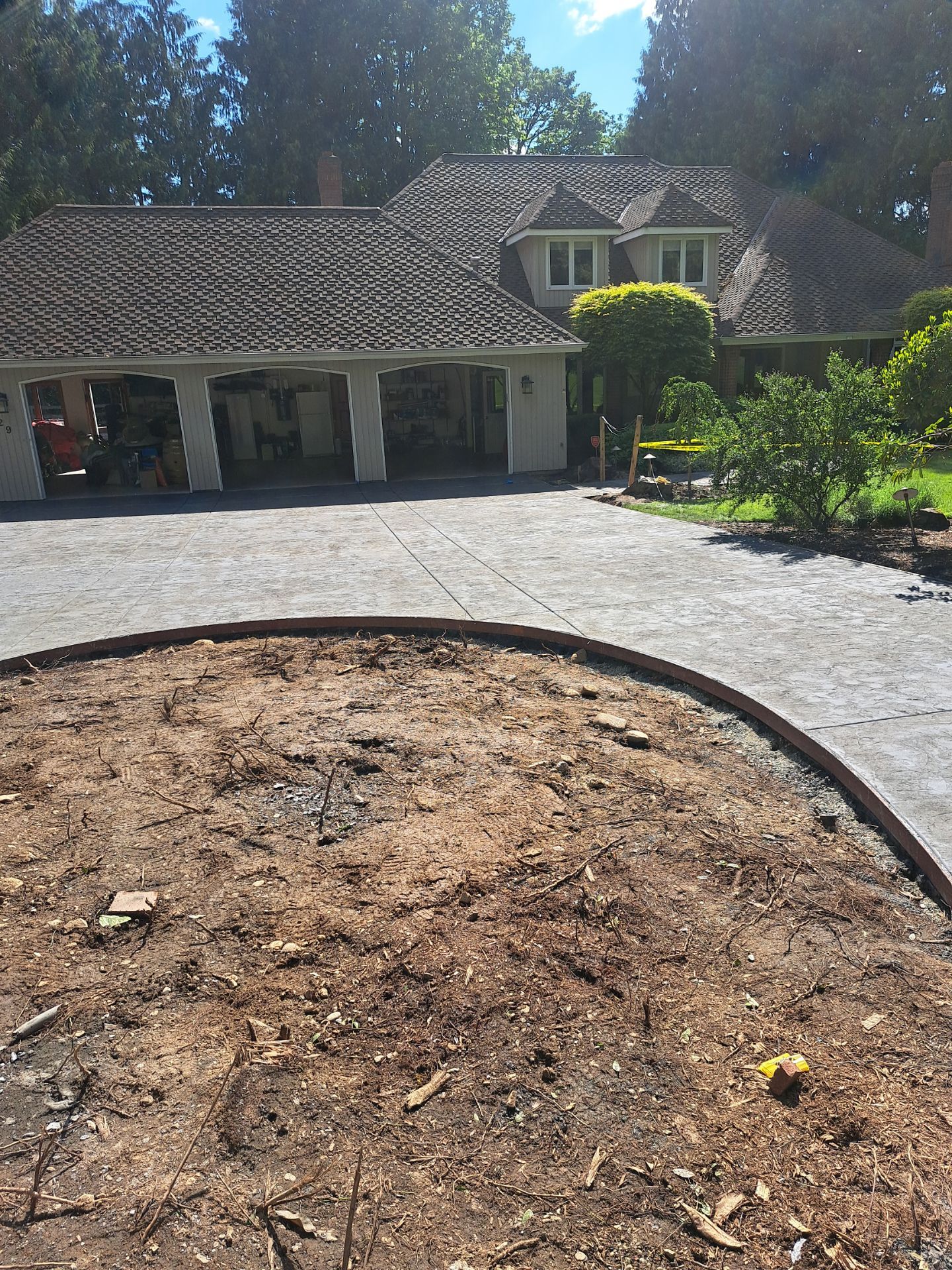 Stamped Concrete Driveway Renovation | Woodinville  by Jireh Asphalt & Concrete Inc 