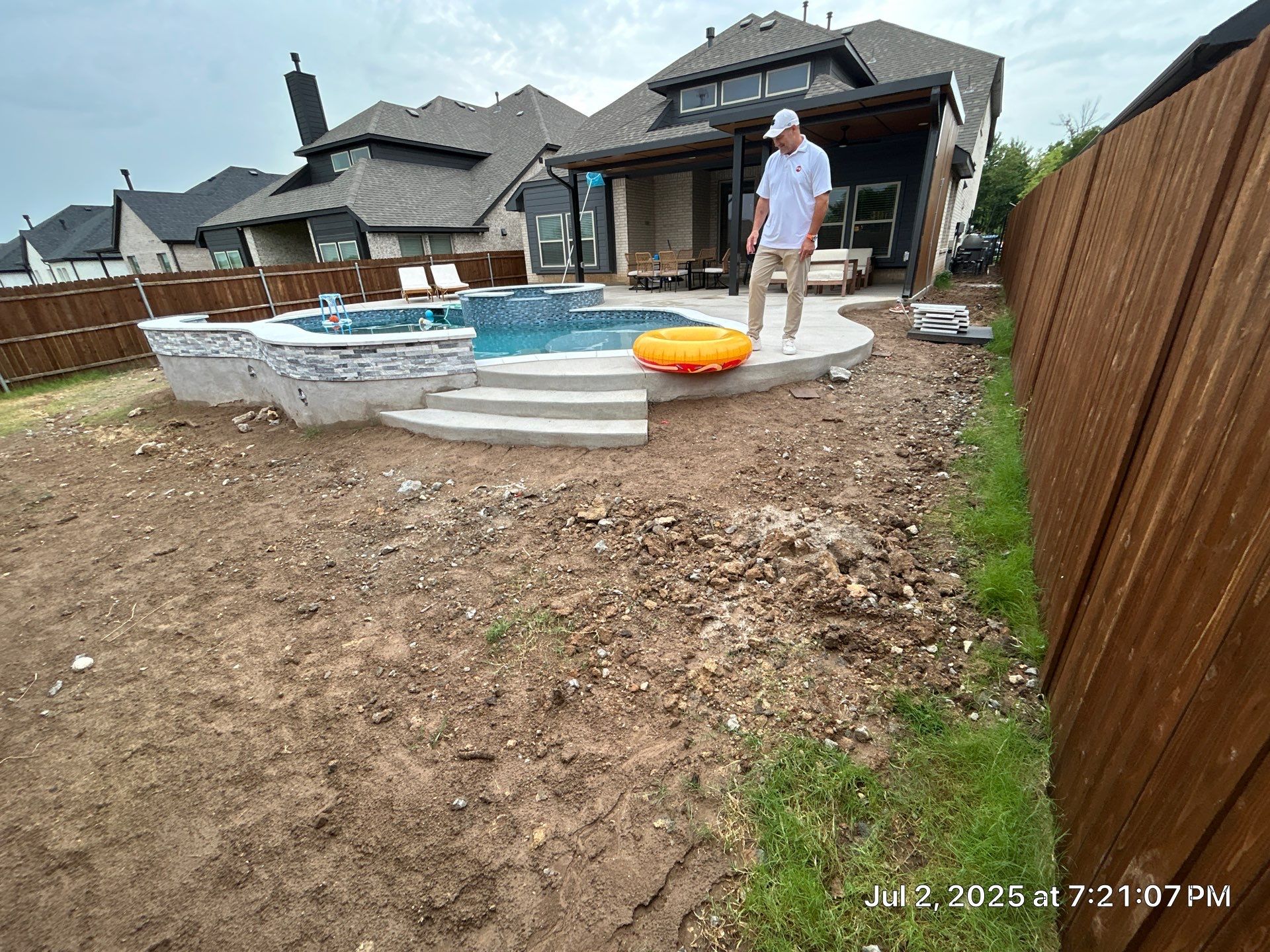 Freeform Pool with Raised Stone Spa by Pinnacle Pools and Spas - DFW