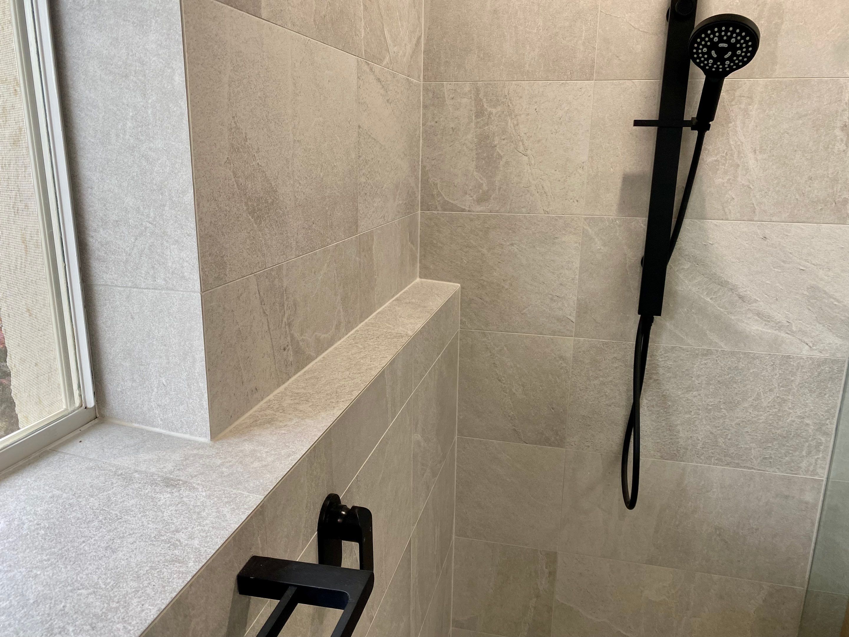 Bathroom Renovation using XROCK 36W White natural 300 x 600 by Re-seal Bathrooms