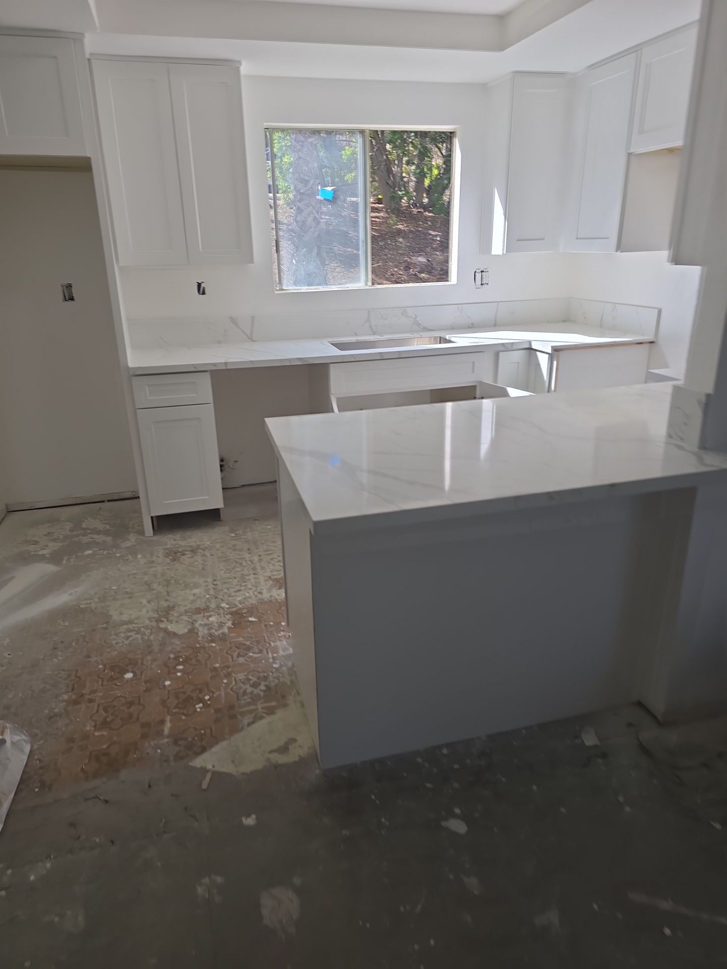 Scope of Work: Installation of Shower, Toilet, Plumbing, Kitchen Sink, and Fixtures by Us Plumbing 