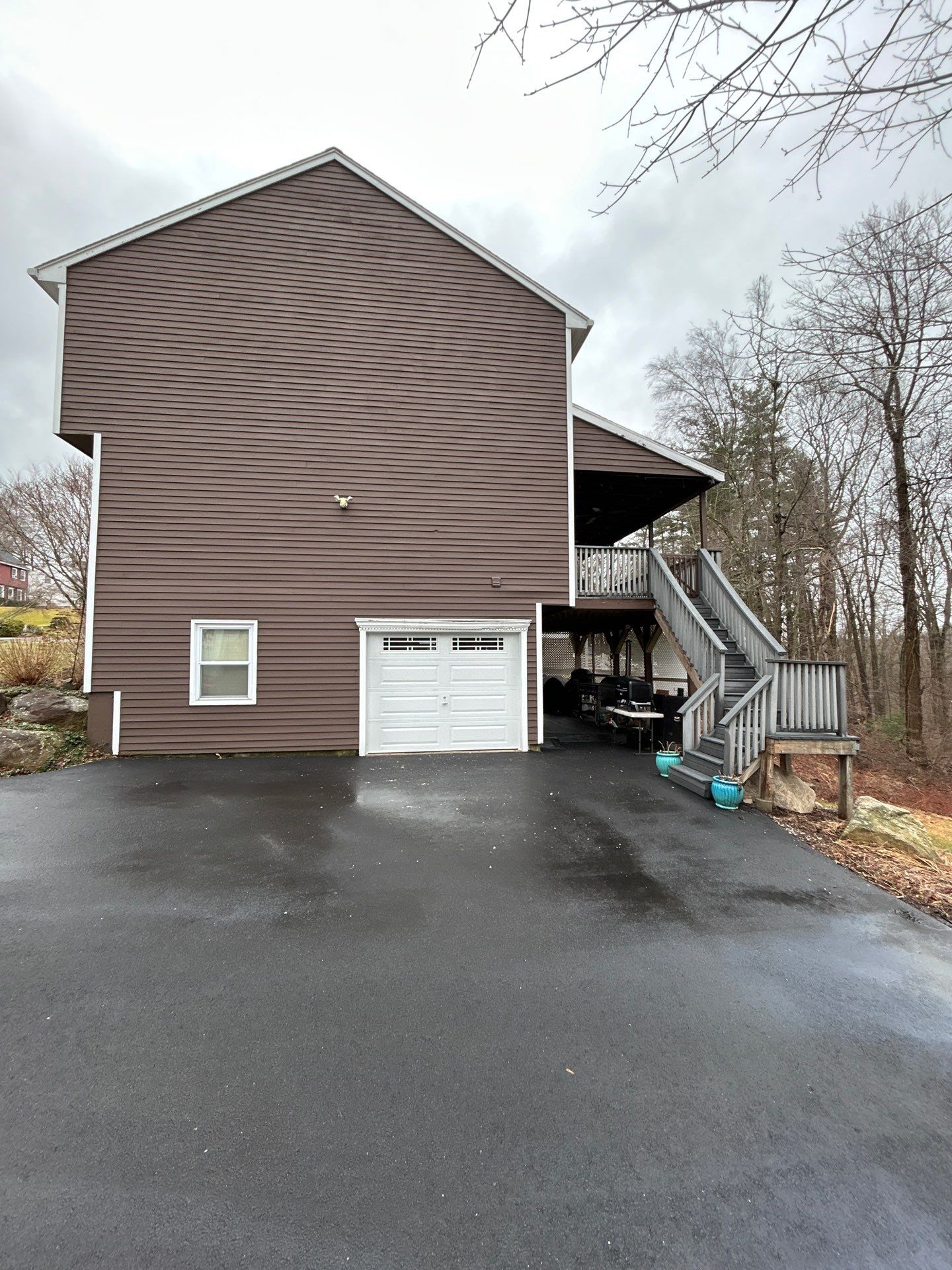 Refined Garage Door Upgrade with Modern Finish by DiGiorgi Roofing and Siding Inc