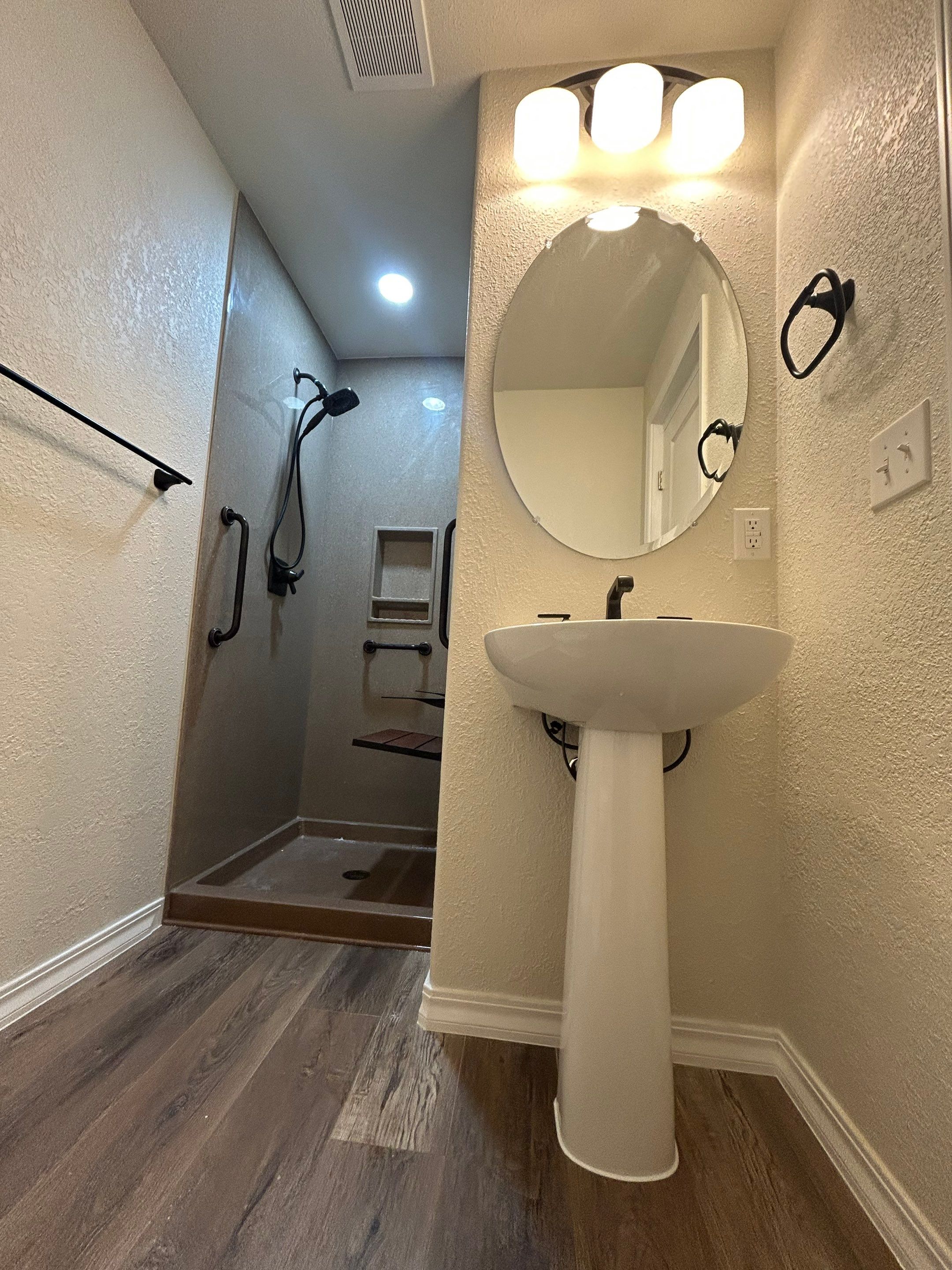 Shower Addition to Powder Room  by Center Point Renovations