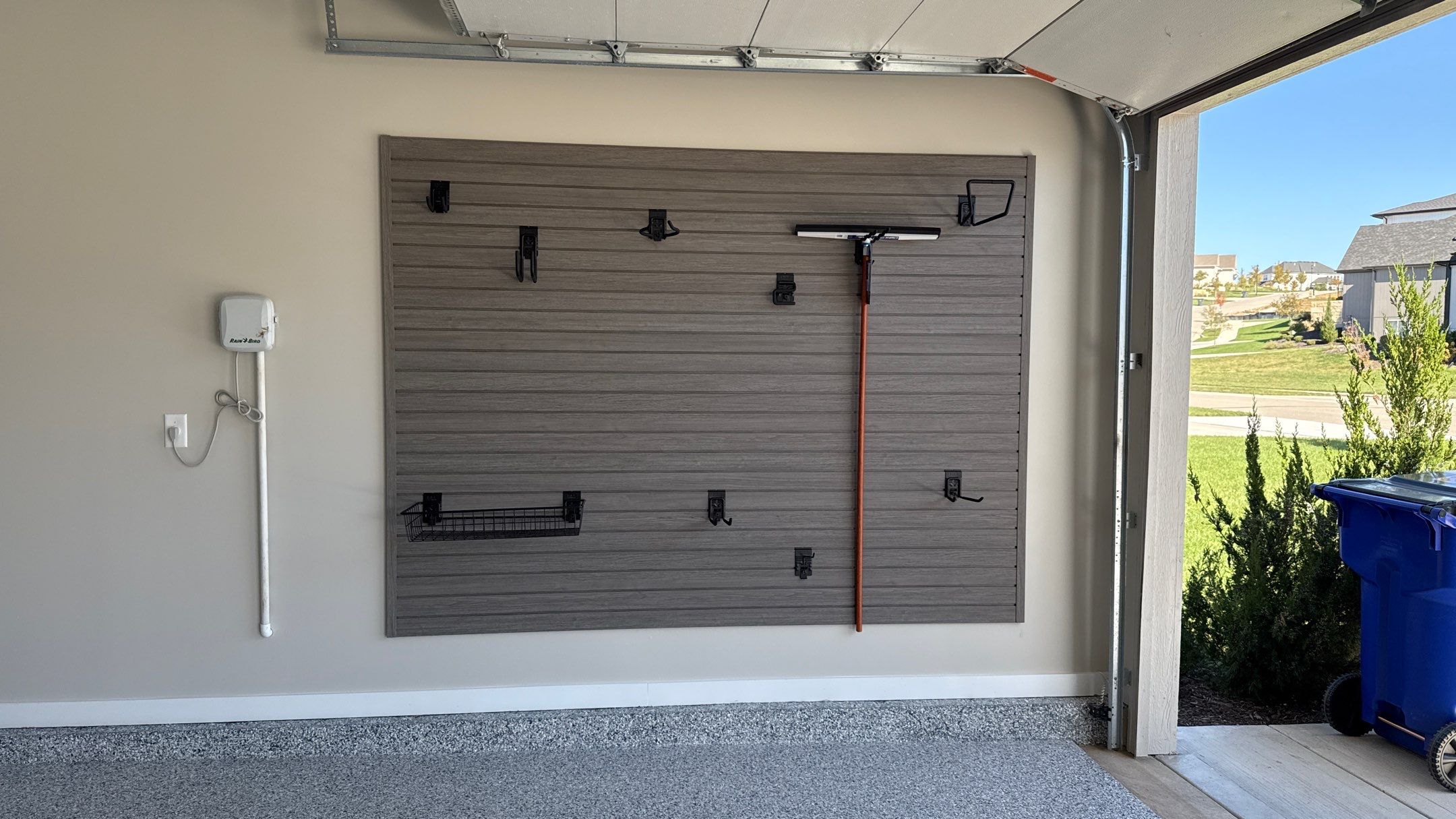 Rachael New Floor and Storage Makes All the Difference by Banner Garage