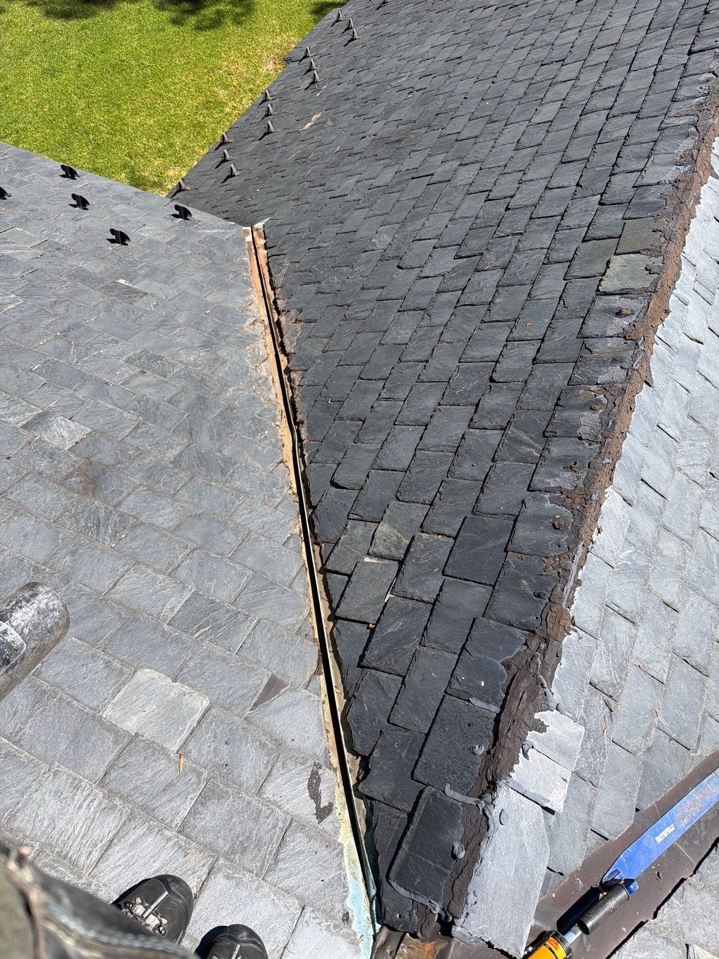 Historical Slate Roof Repair and Chimney Flashing Restoration in West Point by Cade Construction