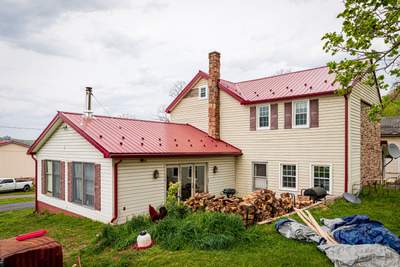 Metal Roof-coloniel red- and new siding