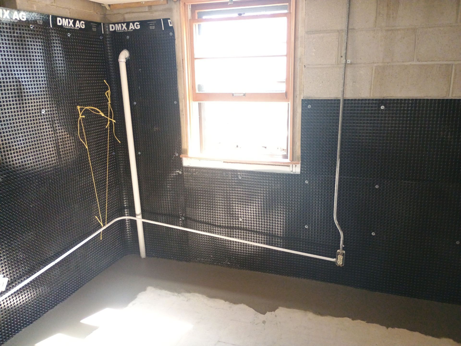 Interior Drain Tile & Foundation Crack Repair in St. Anthony, MN by Waterproofing Northeast