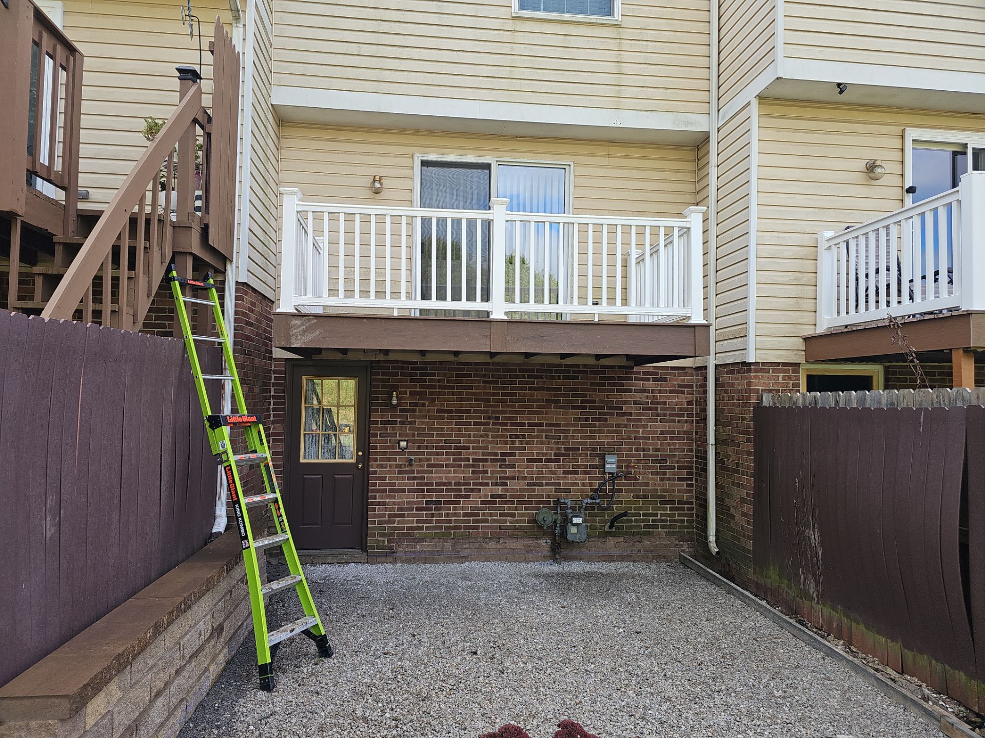 Stamped concrete and redeck  by Cousins Roofing Siding & Decks