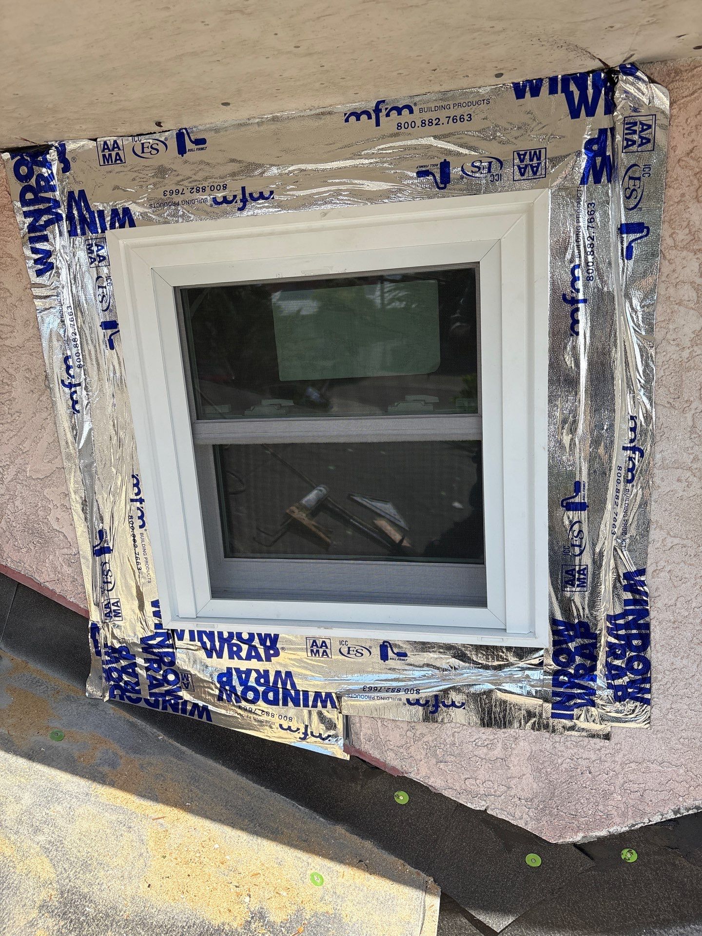 Installing Windows on a Submarine  by Bayfront Roofing and Construction