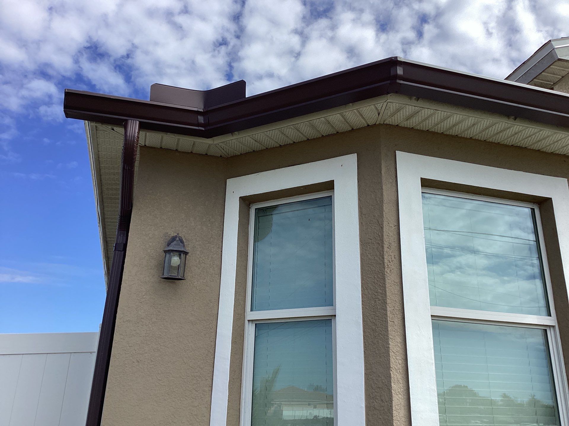 Royal Brown Seamless Gutters in Cape Coral FL by Gutter Professors