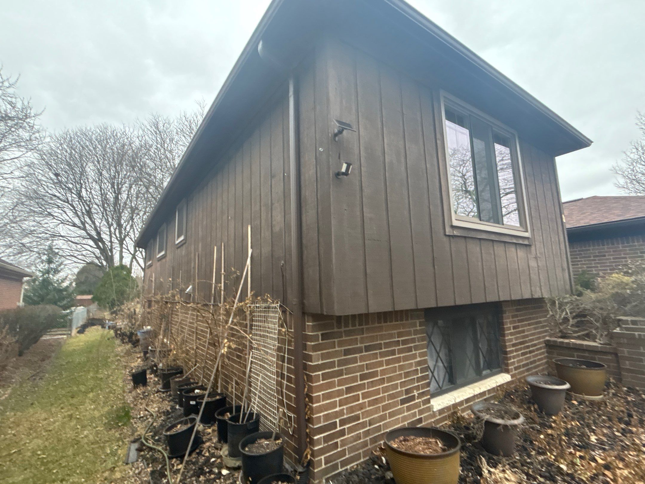 Siding Installation using Ascend 7" Composite Flagship Brown by 180 Contractors