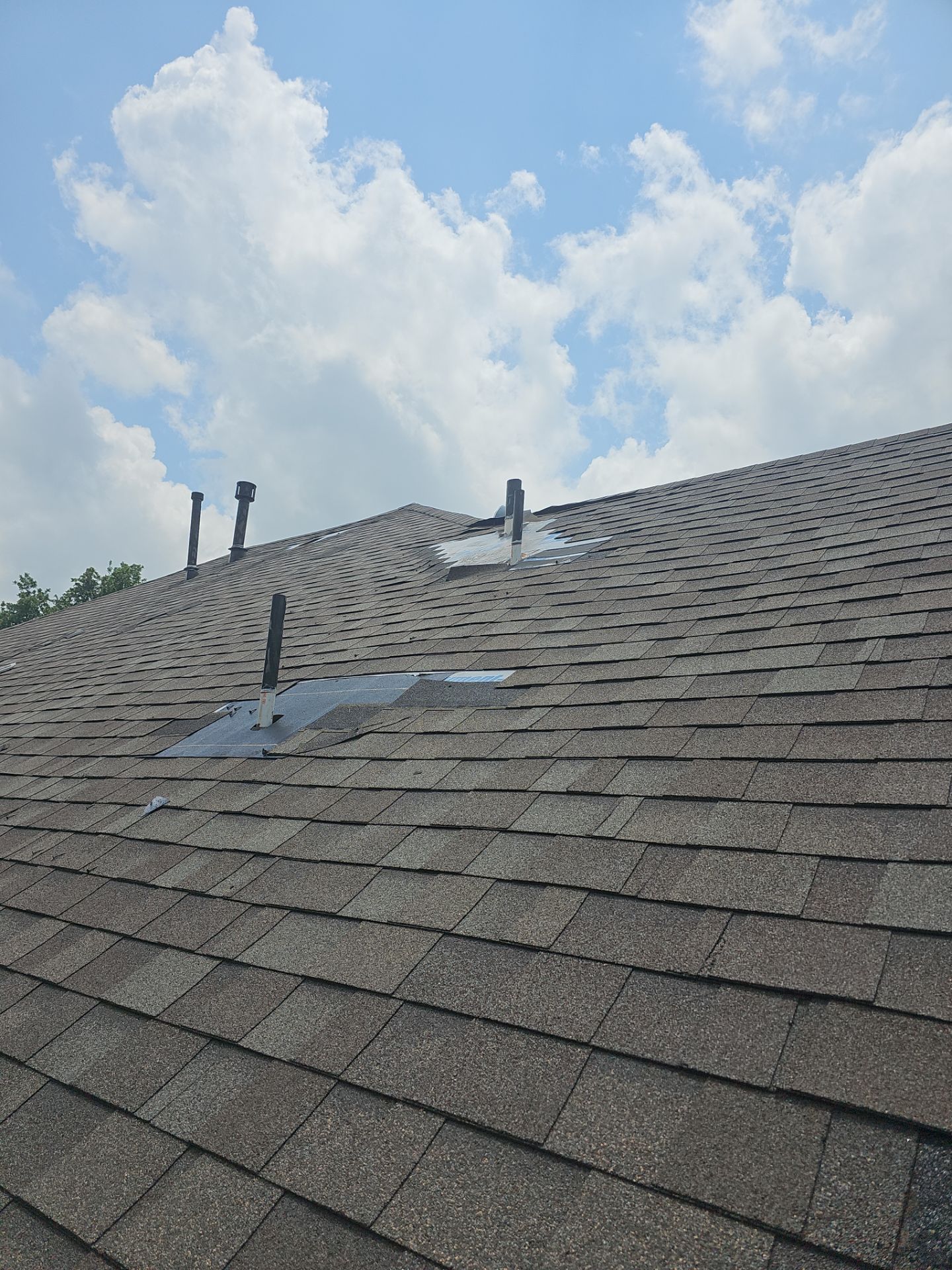 Hail Damage using Owen's Corning Duration (Lifetime) Shingles by Roof Repair Company