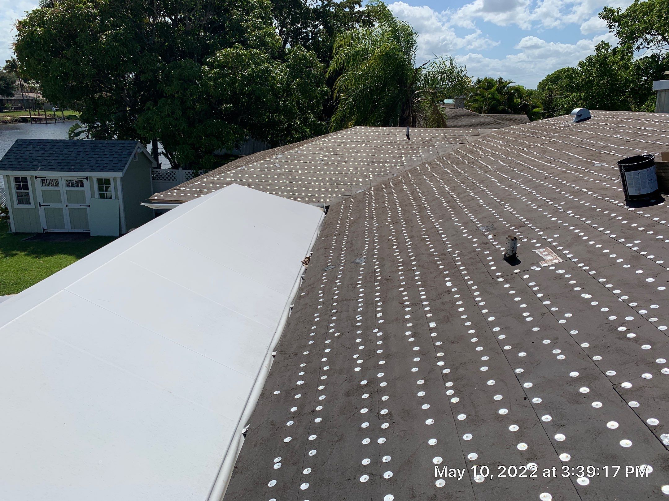Residential Roofing Installation using 1" Nail strip metal roof by BLUES BROTHERS CONSTRUCTION CORP