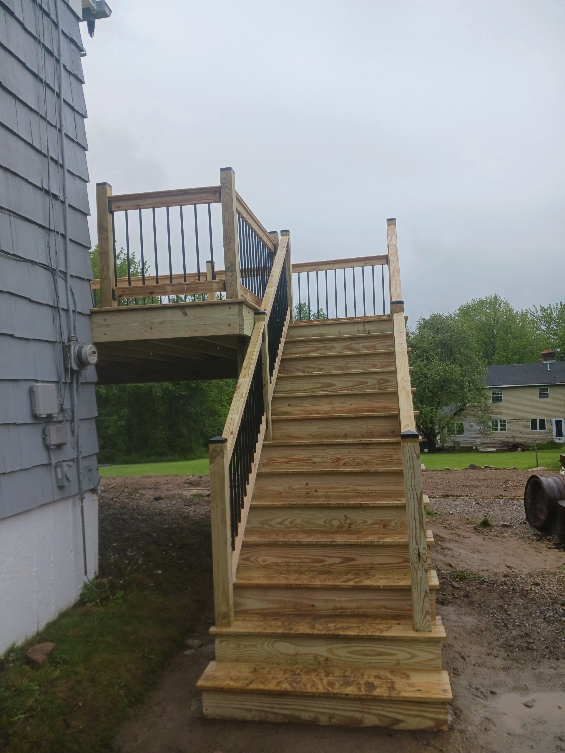 Moultonborough, NH – Pressure-Treated Deck Installation by Tall pine roofing