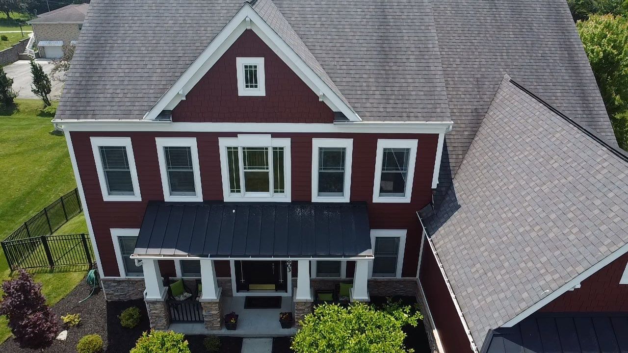 Countrylane Red James Hardie Siding Replacement in Franklin Park by Knockout Home Solutions