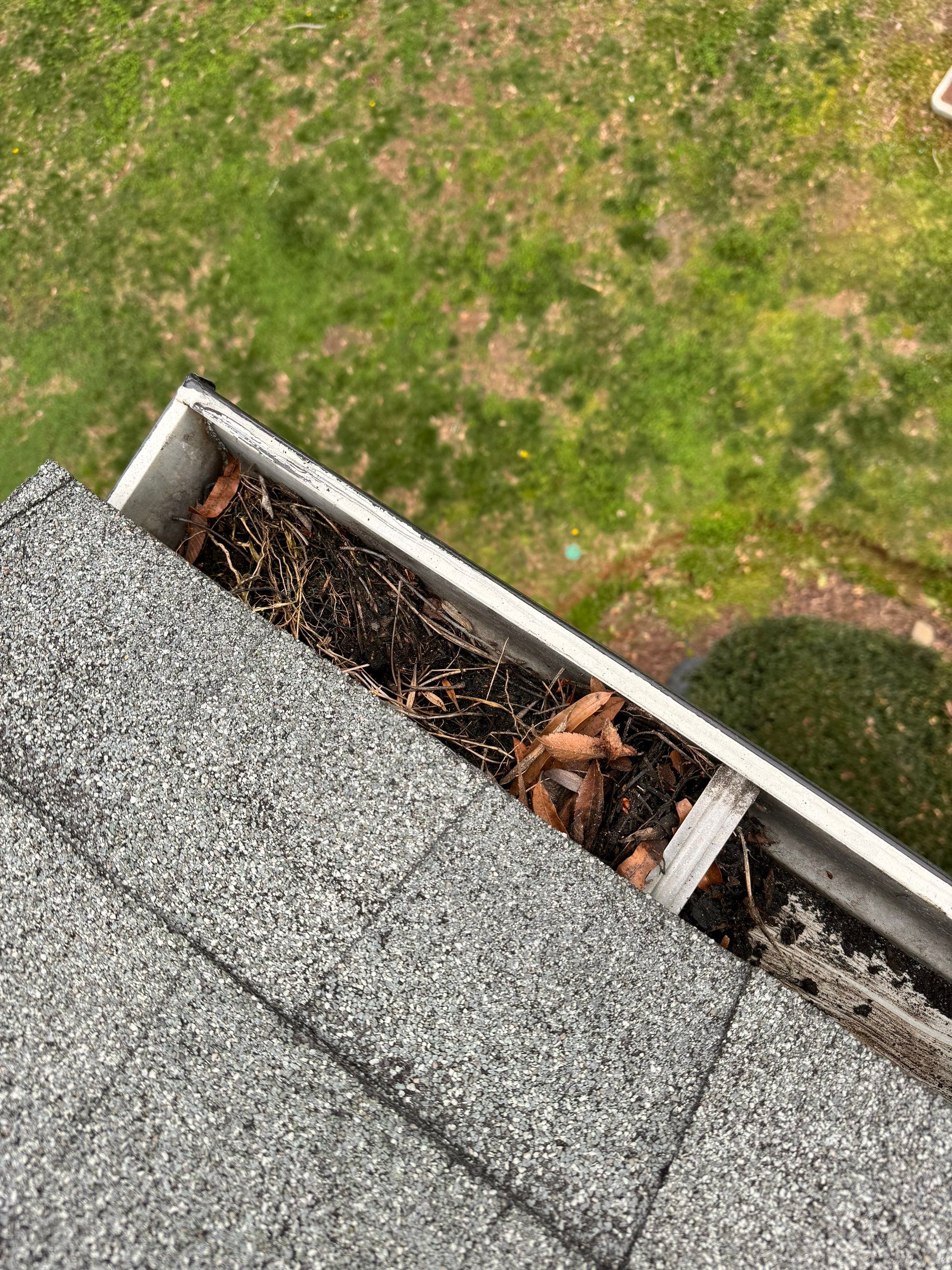 Commercial gutter cleaning Concord & Kannapolis, NC	 before photo with filled gutters