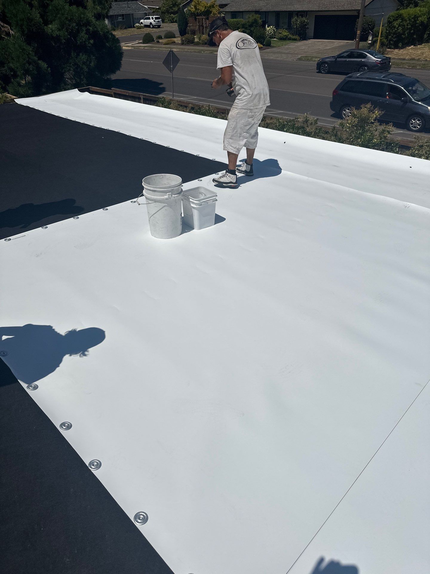 Residential Flat Roof Installation using GAF 60Mil TPO  by Orezona Building & Roofing Company, Inc.