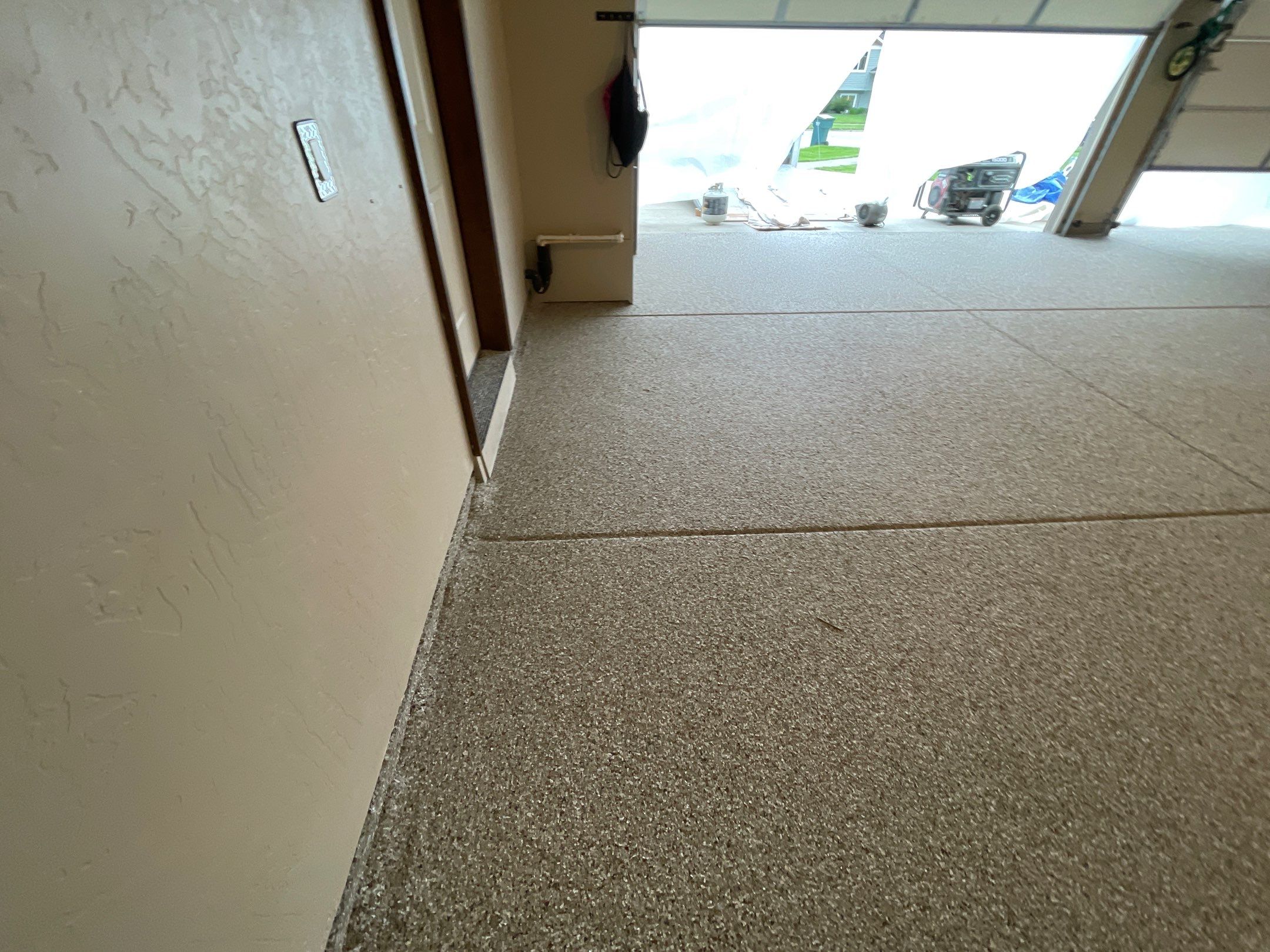 Garage Transformation using Pebble Beach and Front Porch using Greystone by Croc Coatings, LLC