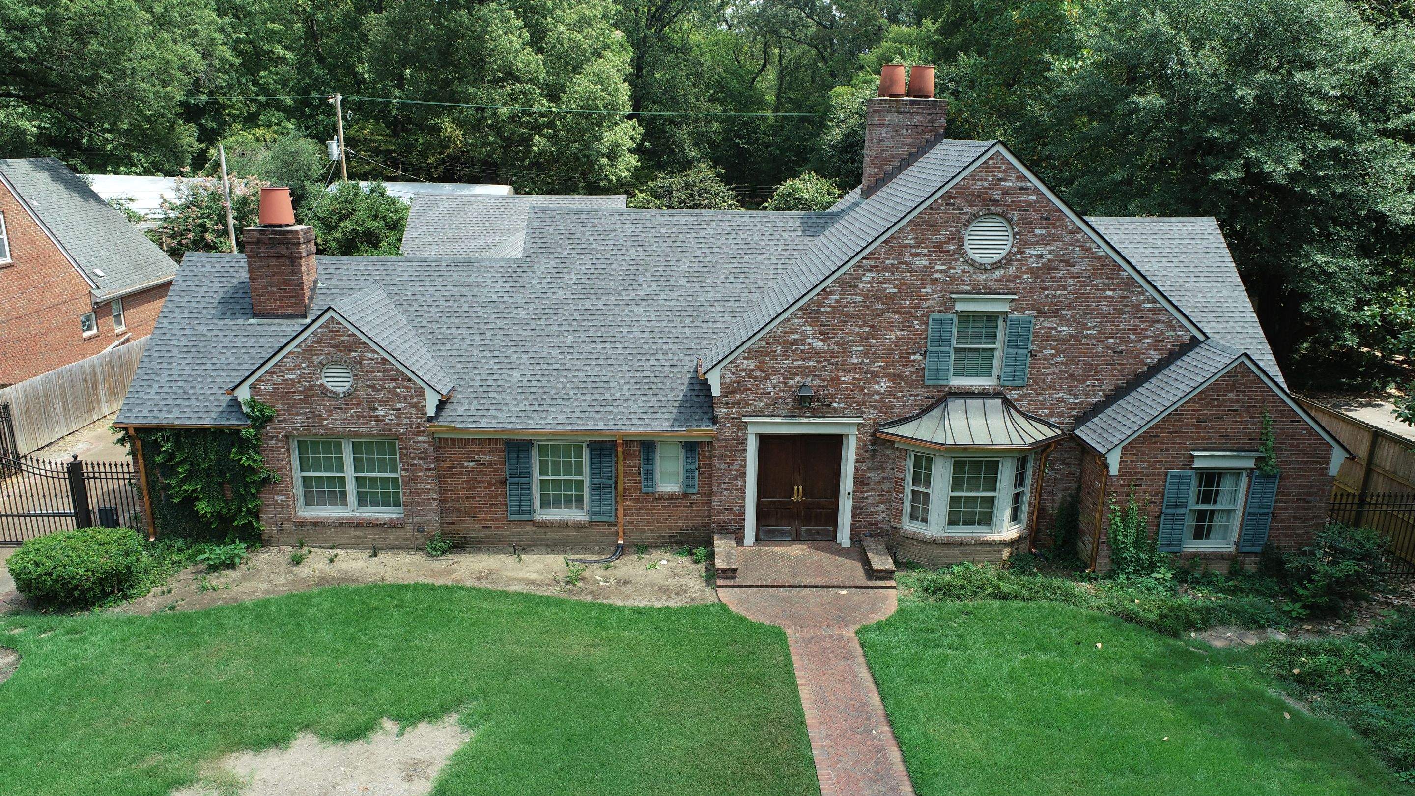 Full Roof Replacement with gutter upgrade after tree impact damage in East Memphis by Revival Roofing Services