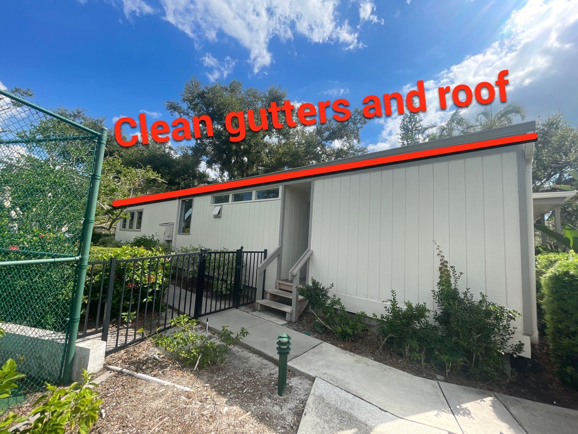 Clean Gutters and Roof in Sarasota FL by Gutter Professors