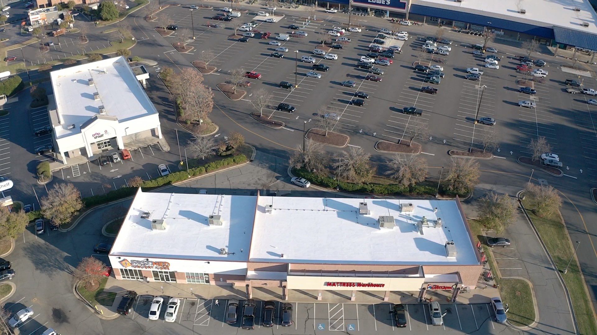 Commercial Coating using Poly Urerthane and Silicone Coating by Just In Time Roofing and Restoration