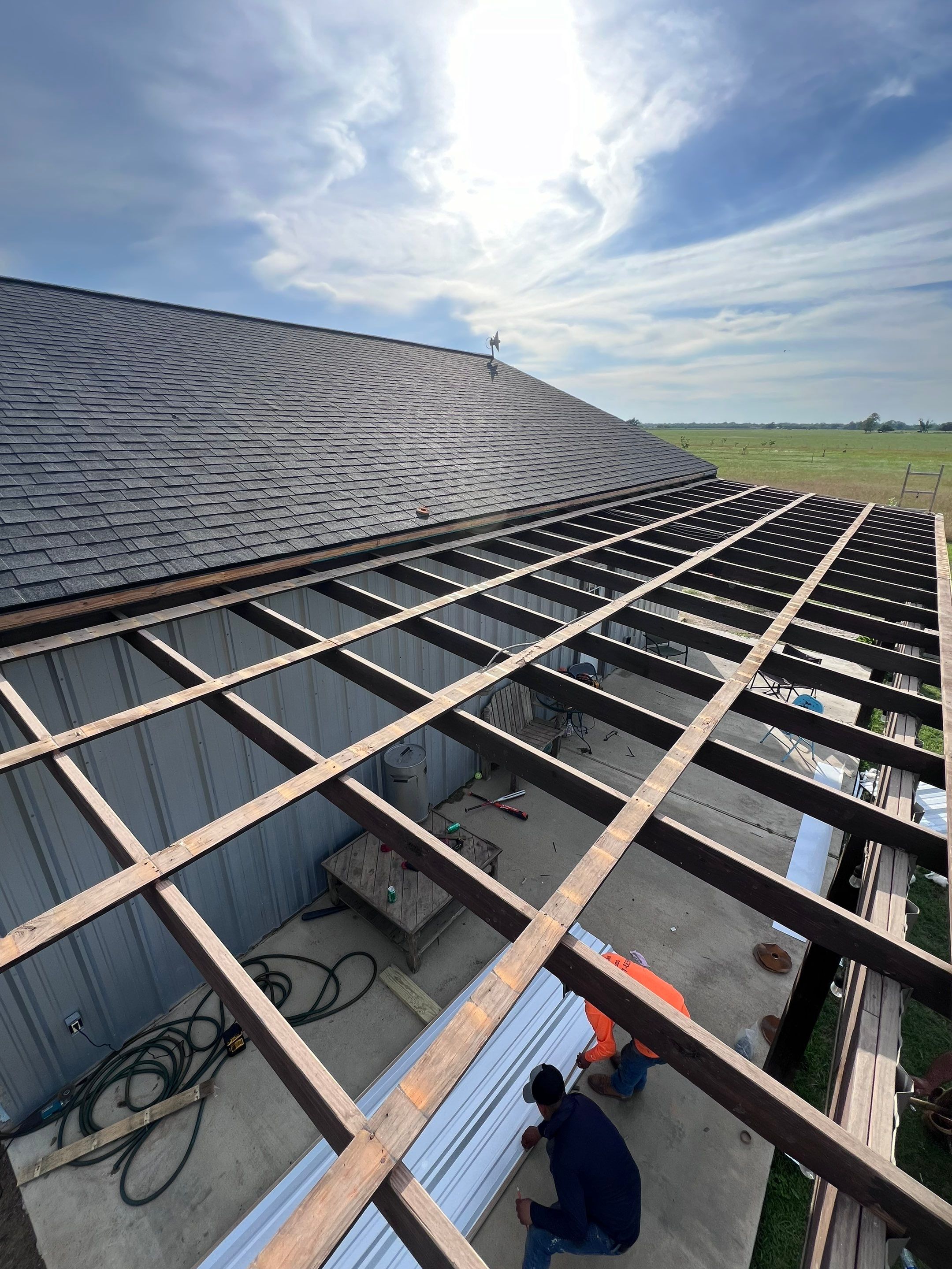 Residential Roofing Installation using Metal by Roof Repair Company