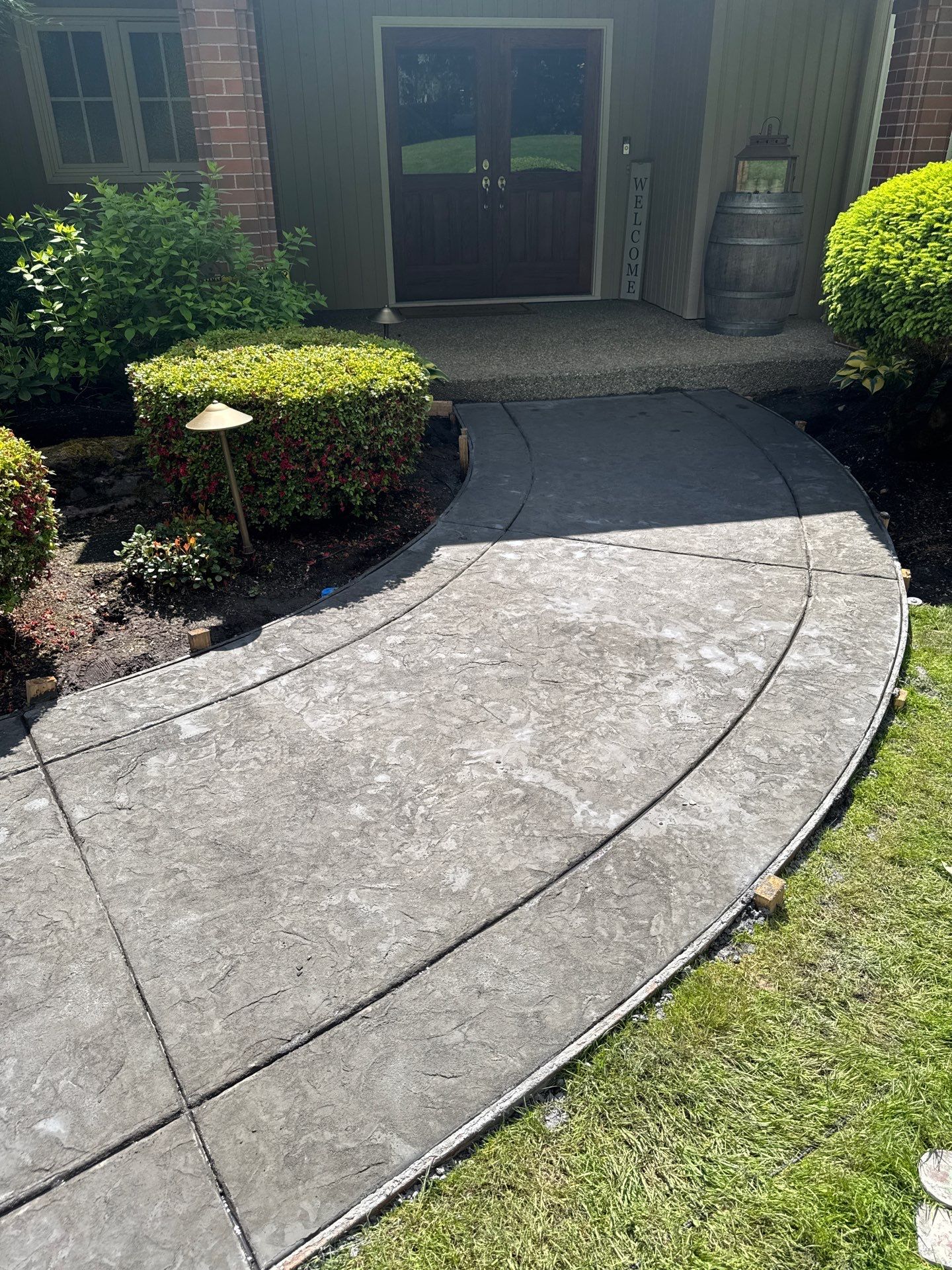Stamped Concrete Driveway Renovation | Woodinville  by Jireh Asphalt & Concrete Inc 