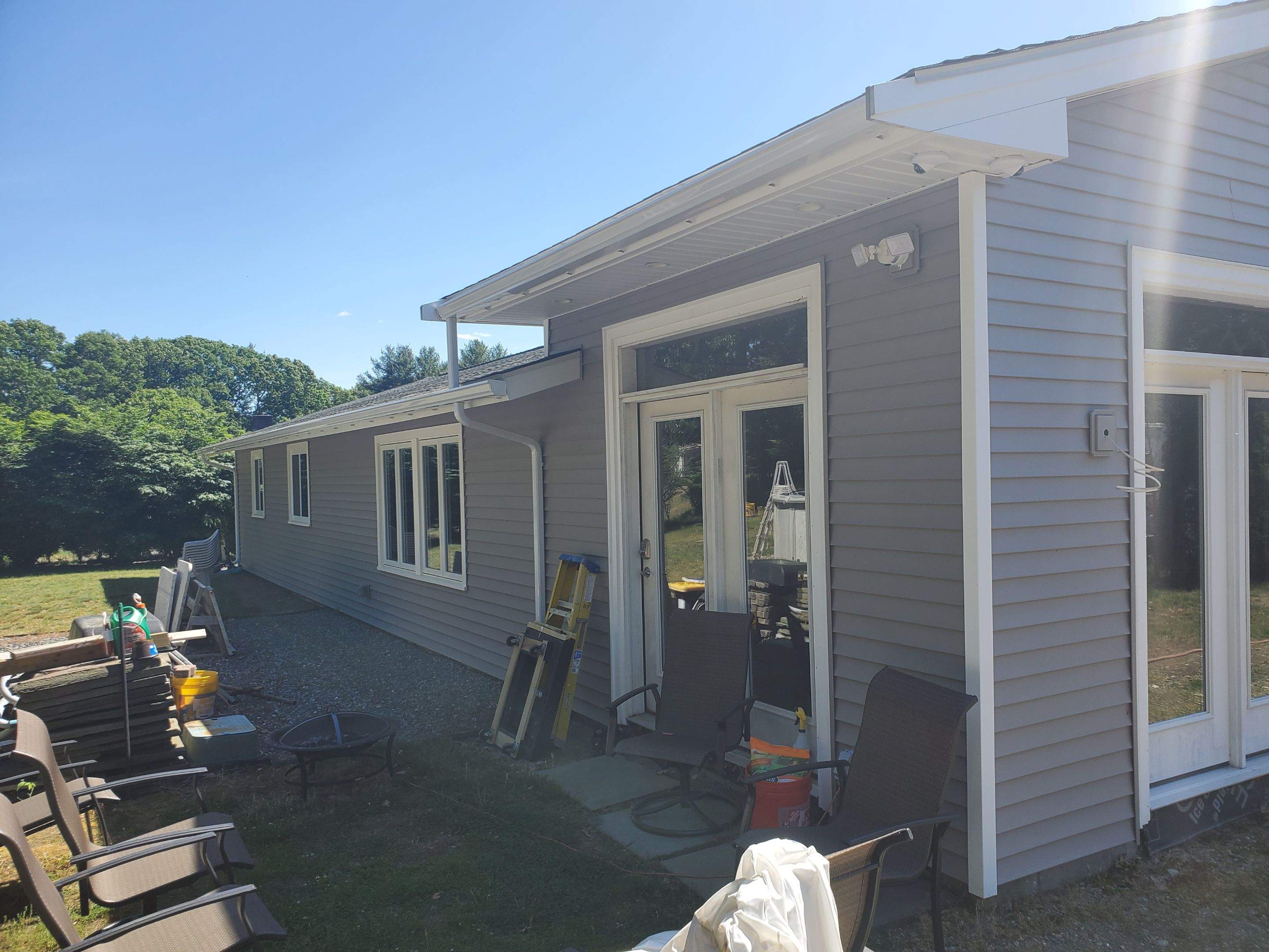 Siding Installation using insulation, PVC trim and vinyl siding by UBrothers Construction