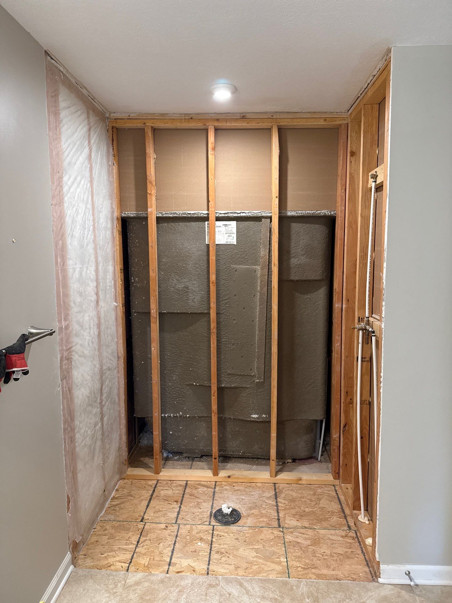 Custom Jacuzzi Walk-In Shower Remodel with Stone-Look Tile in Traverse City by Rainbow Seamless Systems
