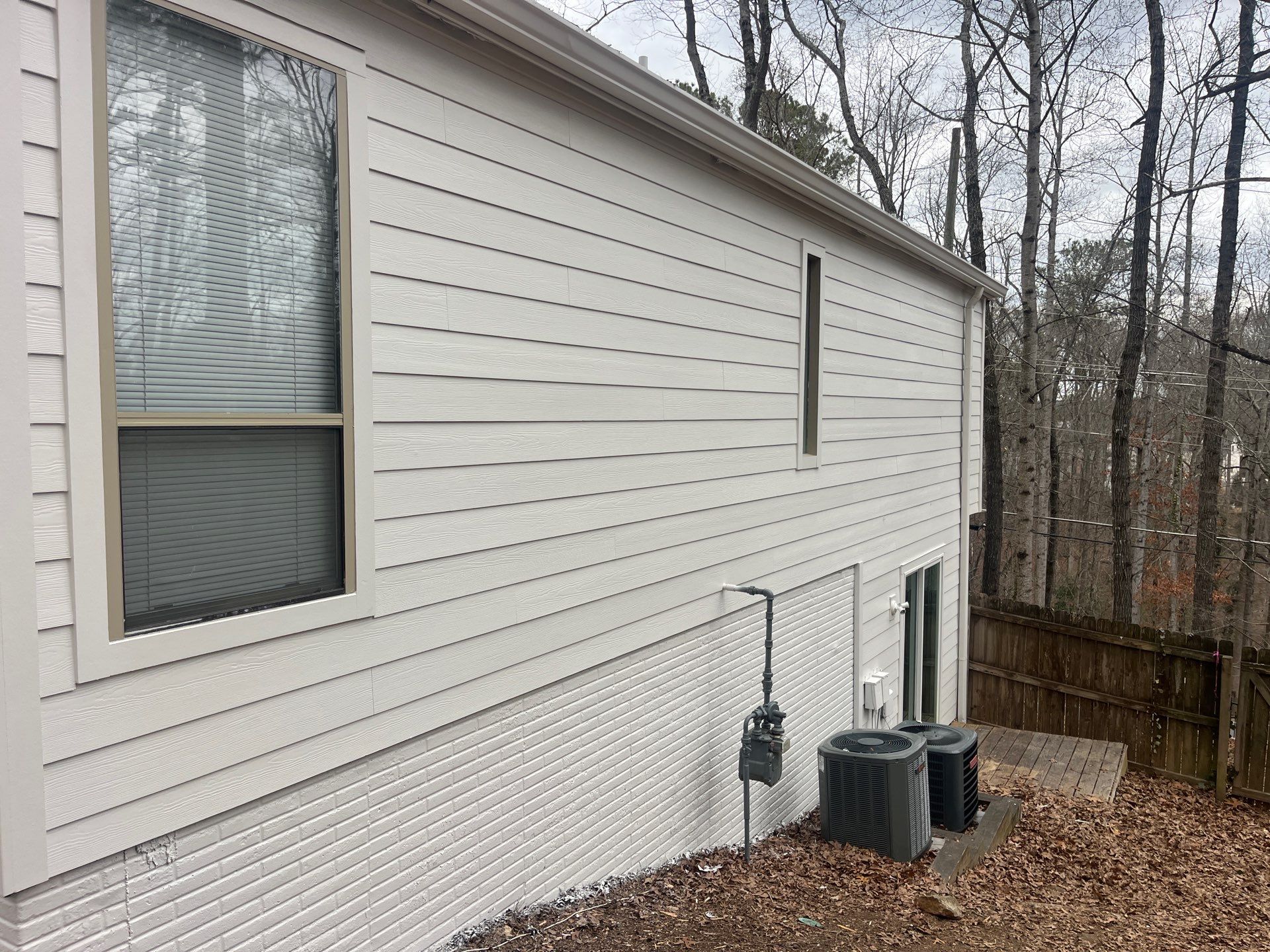 Siding, Fascia, Soffit, Rotten Wood, and Door Replacement on Marietta, GA Home by Nelson Exteriors