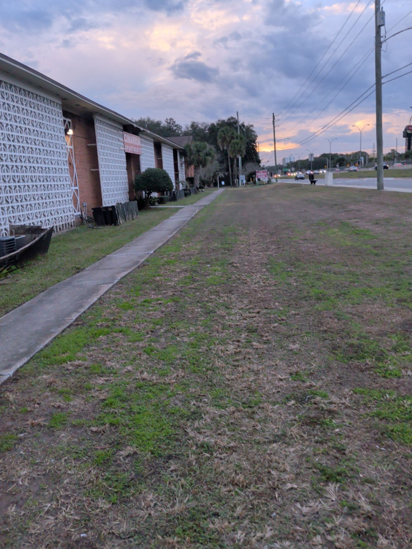 Apartment Landscape Cleanup & Ongoing Grounds Maintenance — Cimarron Apartments (Arlington) by Harmoni Home Services