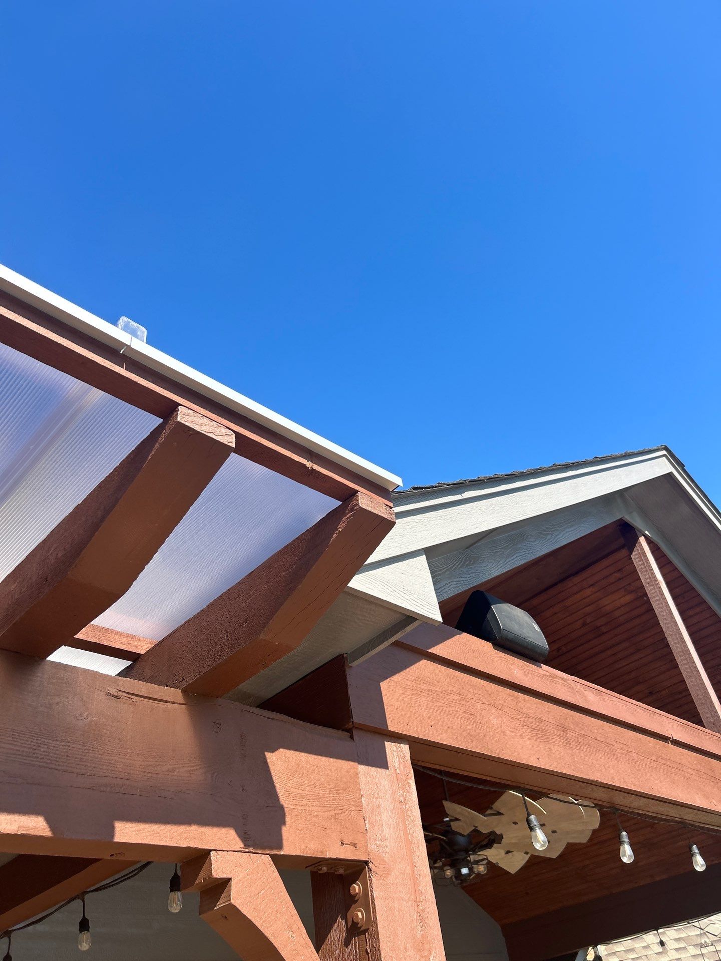 Siding Replacement and Exterior Painting and Pergola Cover Install in Edmond, OK by McCann's Roofing and Construction