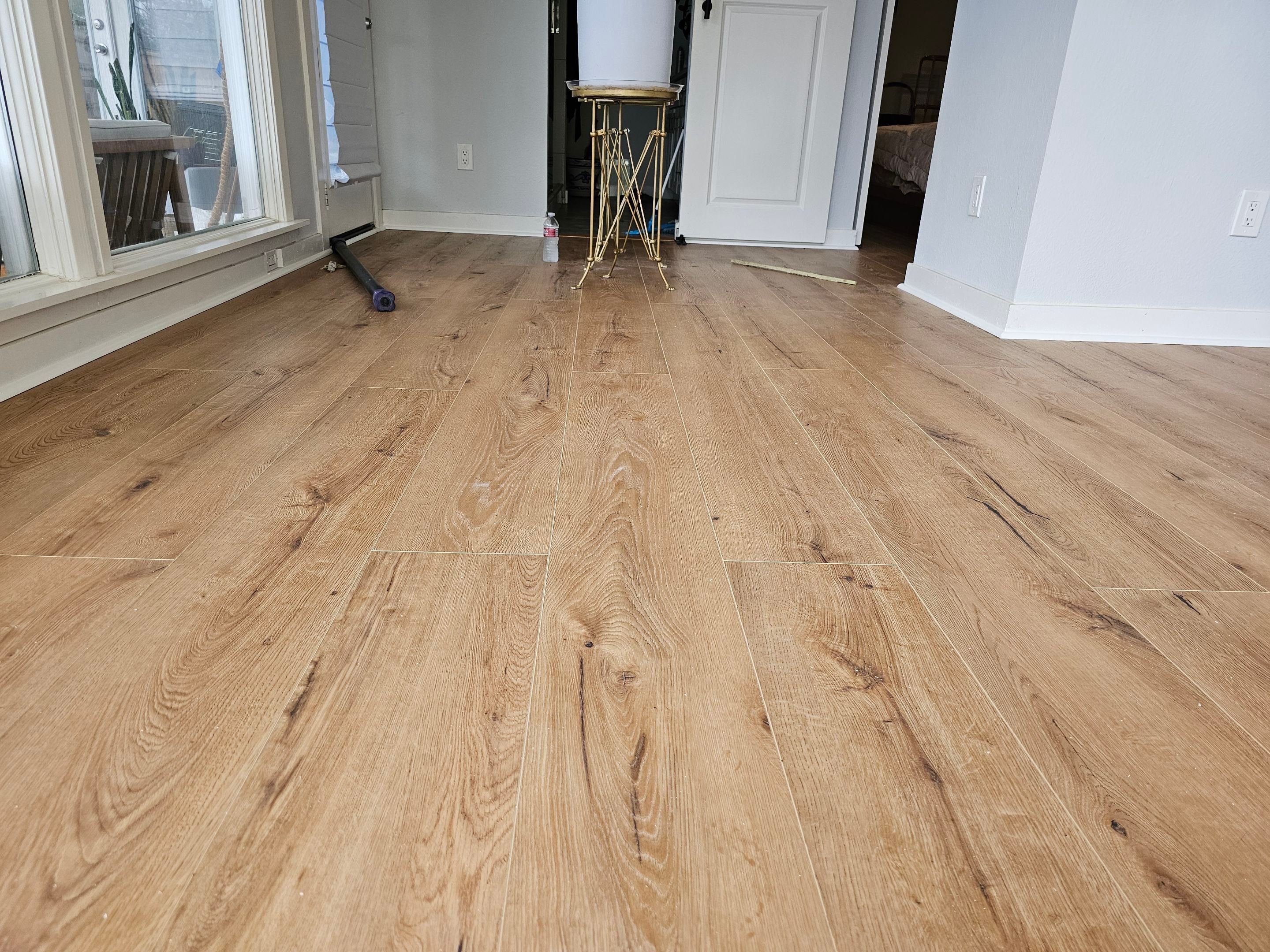 Laminate floor & fence by EL-GC LLC 