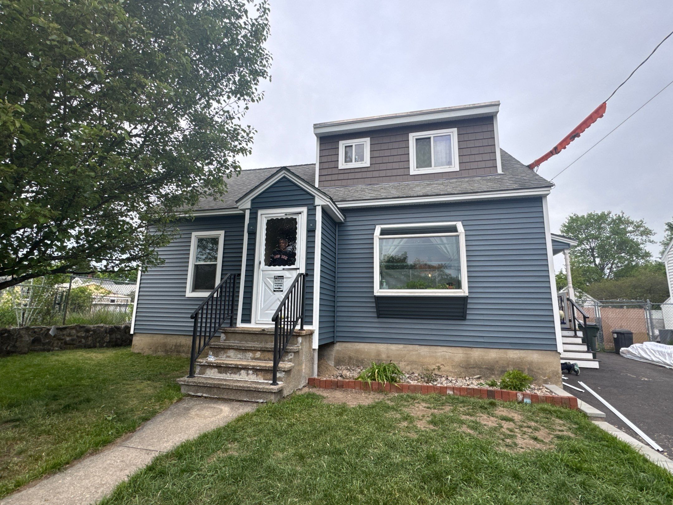 Full Siding Replacement in Manchester, NH Using CertainTeed Siding Products by Compass exteriors