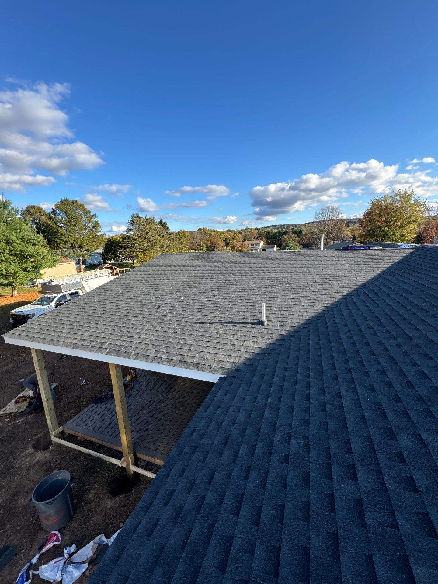 Residential Addition and Covered Porch Roof  by Esh Builders