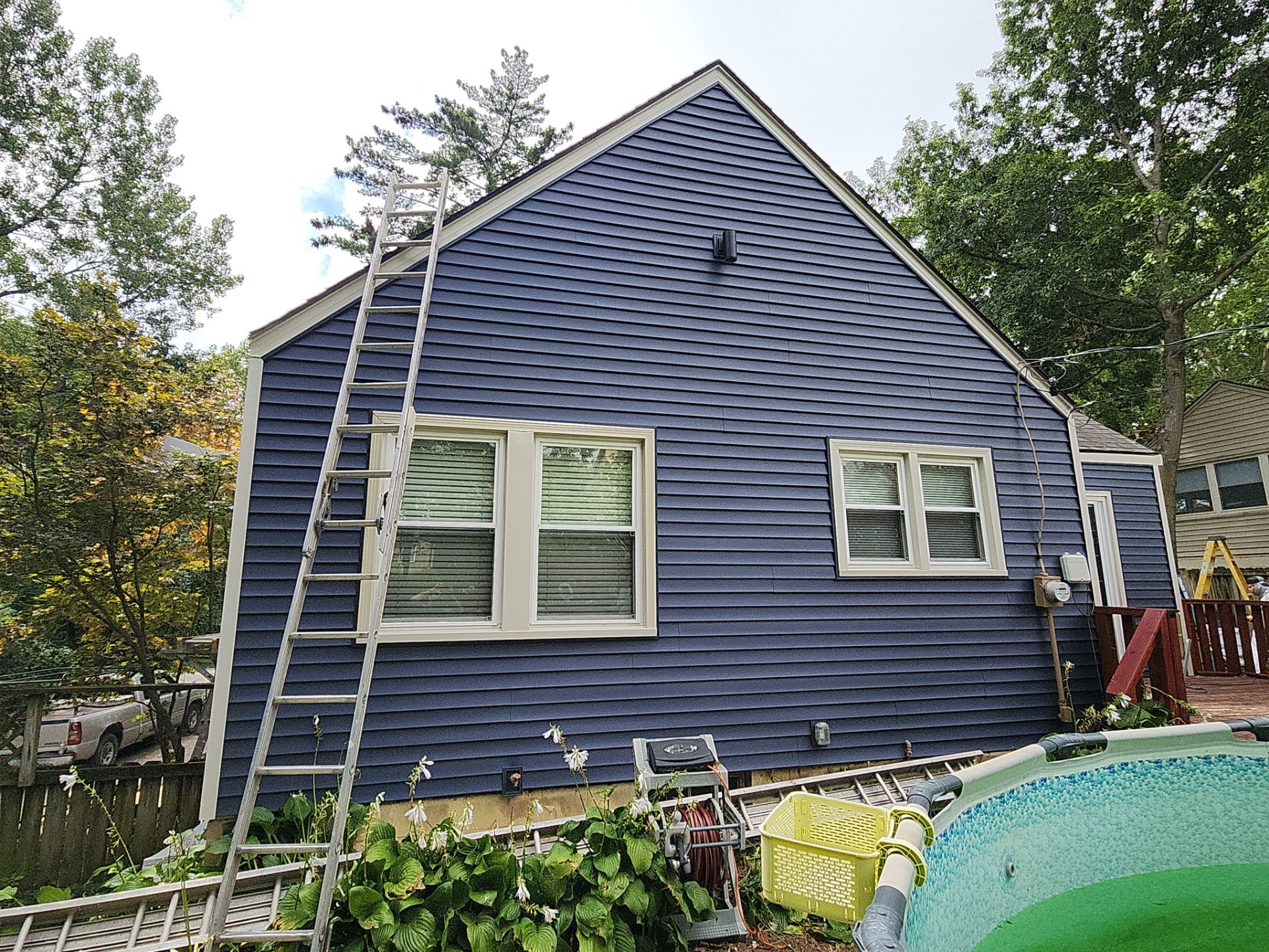 Kansas City Indigo Insulated Craneboard Siding and Window Replacement Project in Kansas City by EEC Windows, Siding & Roofing