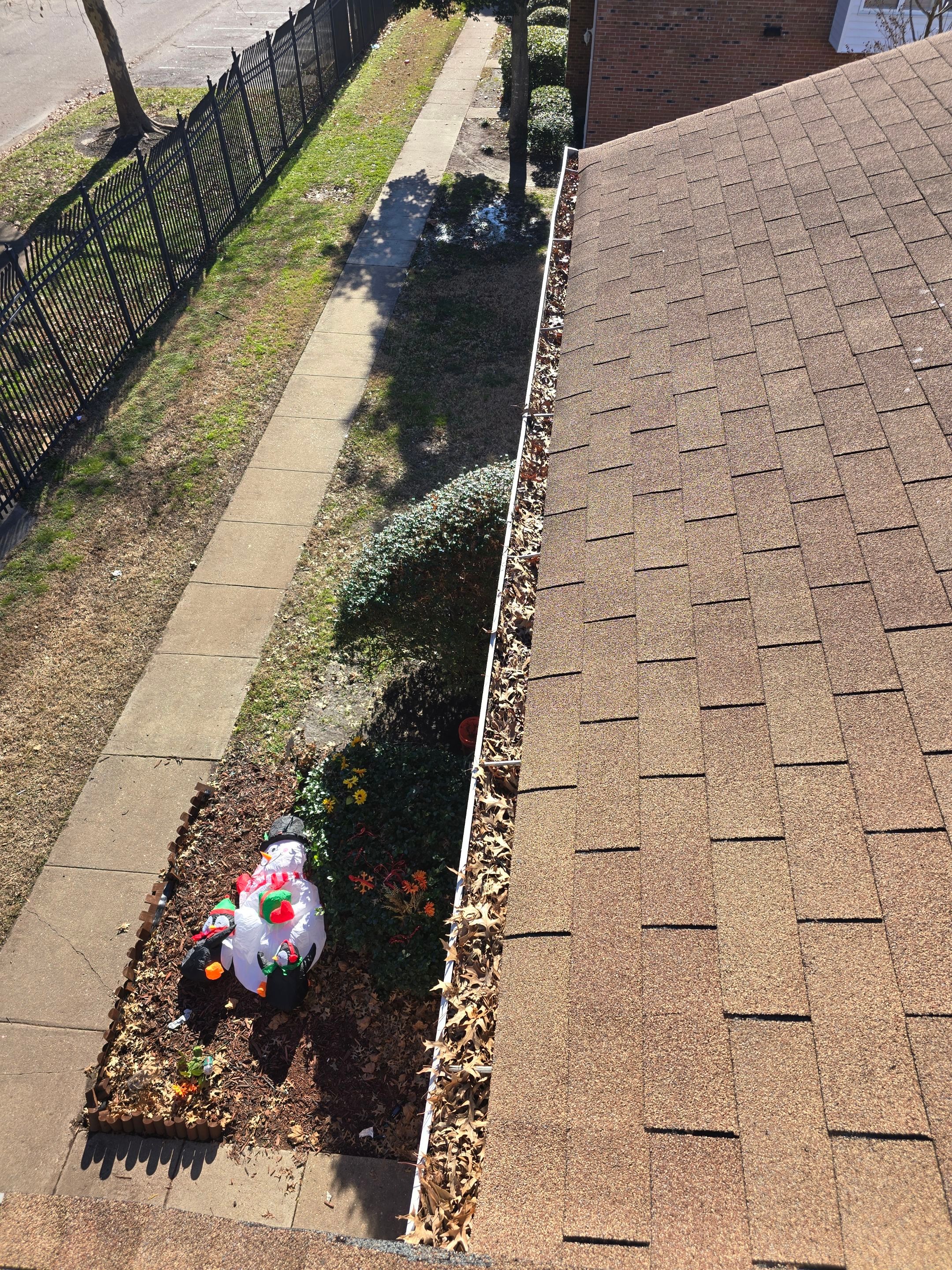 Commercial gutter cleaning Newport News & Hampton, VA	 before photo with filled gutters
