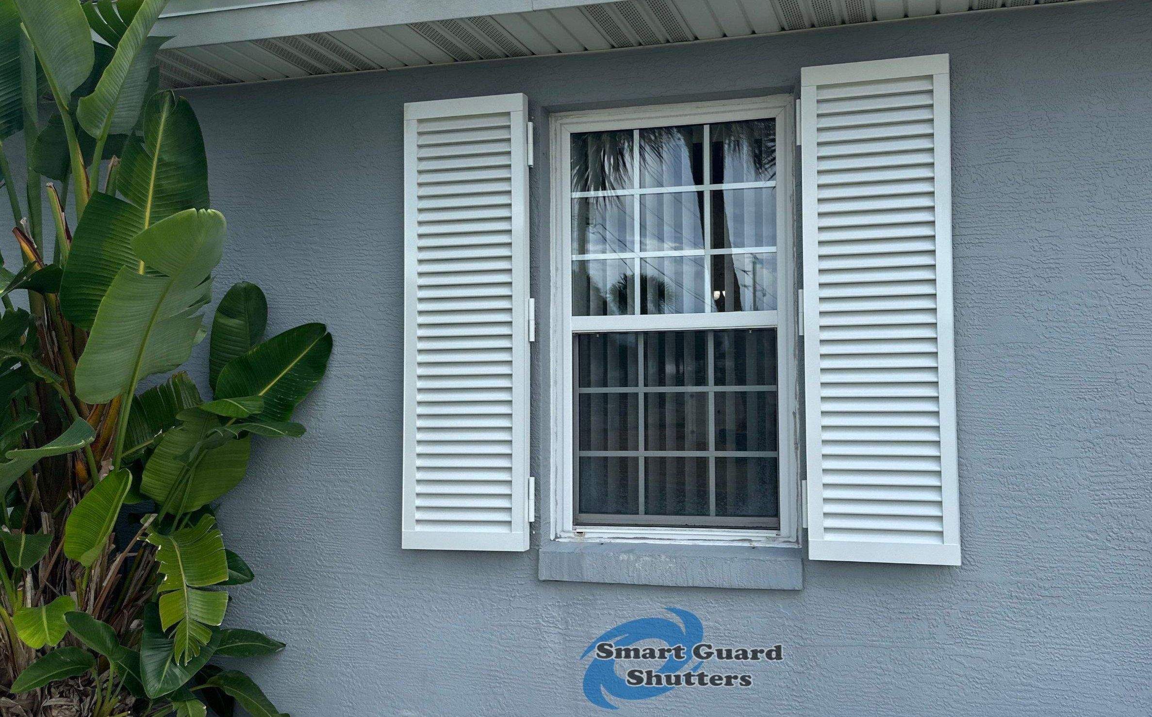 Impact Colonial Shutters in Signal White by Smart Guard Shutters