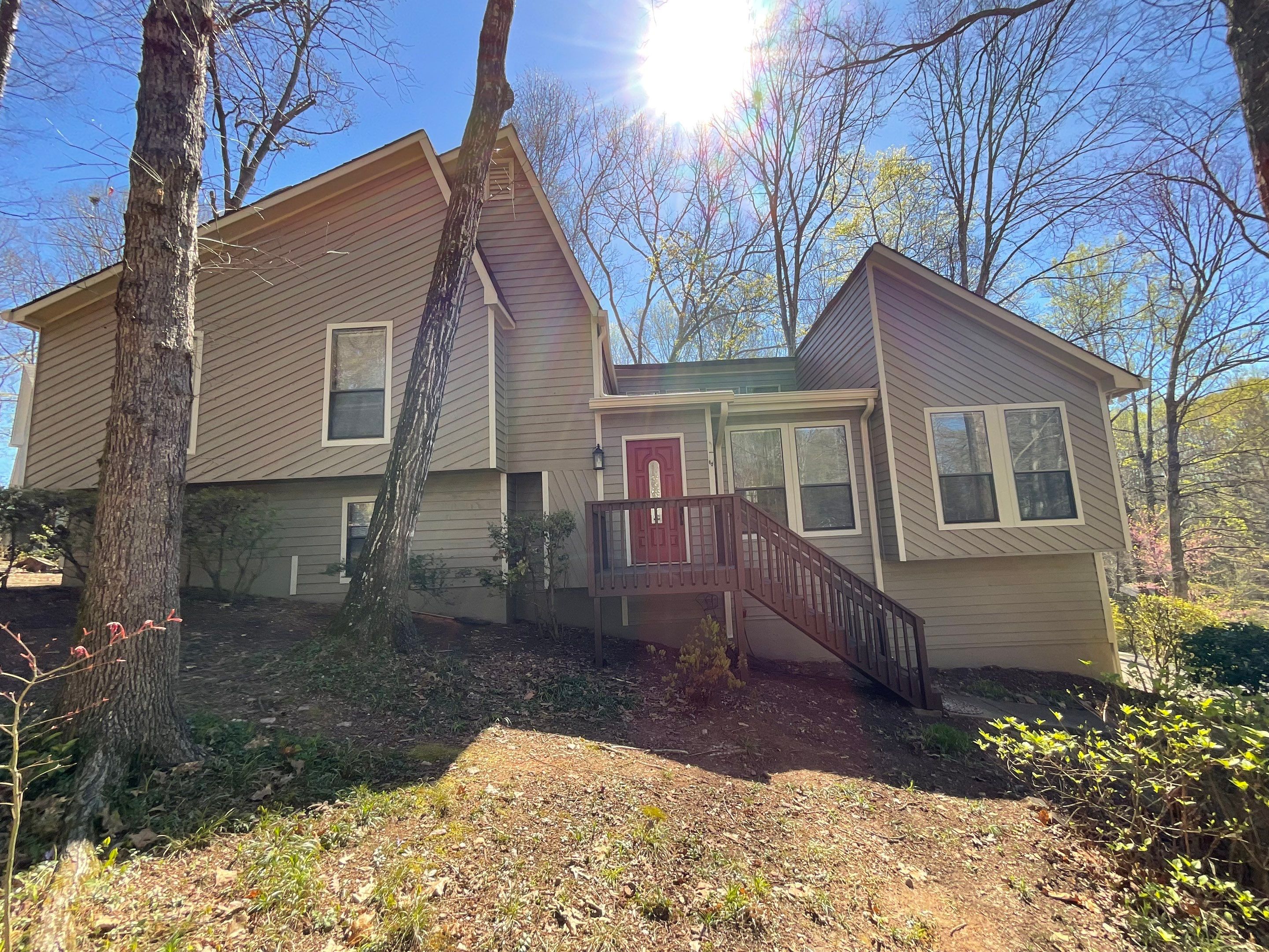 Exterior Painting and Deck Refinishing for an Acworth Residence by Swift Home Renovations
