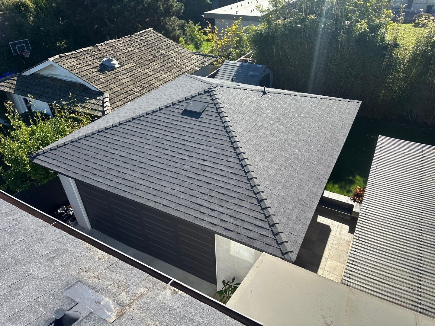 Estate Gray Shingles by Reimagine Roofing