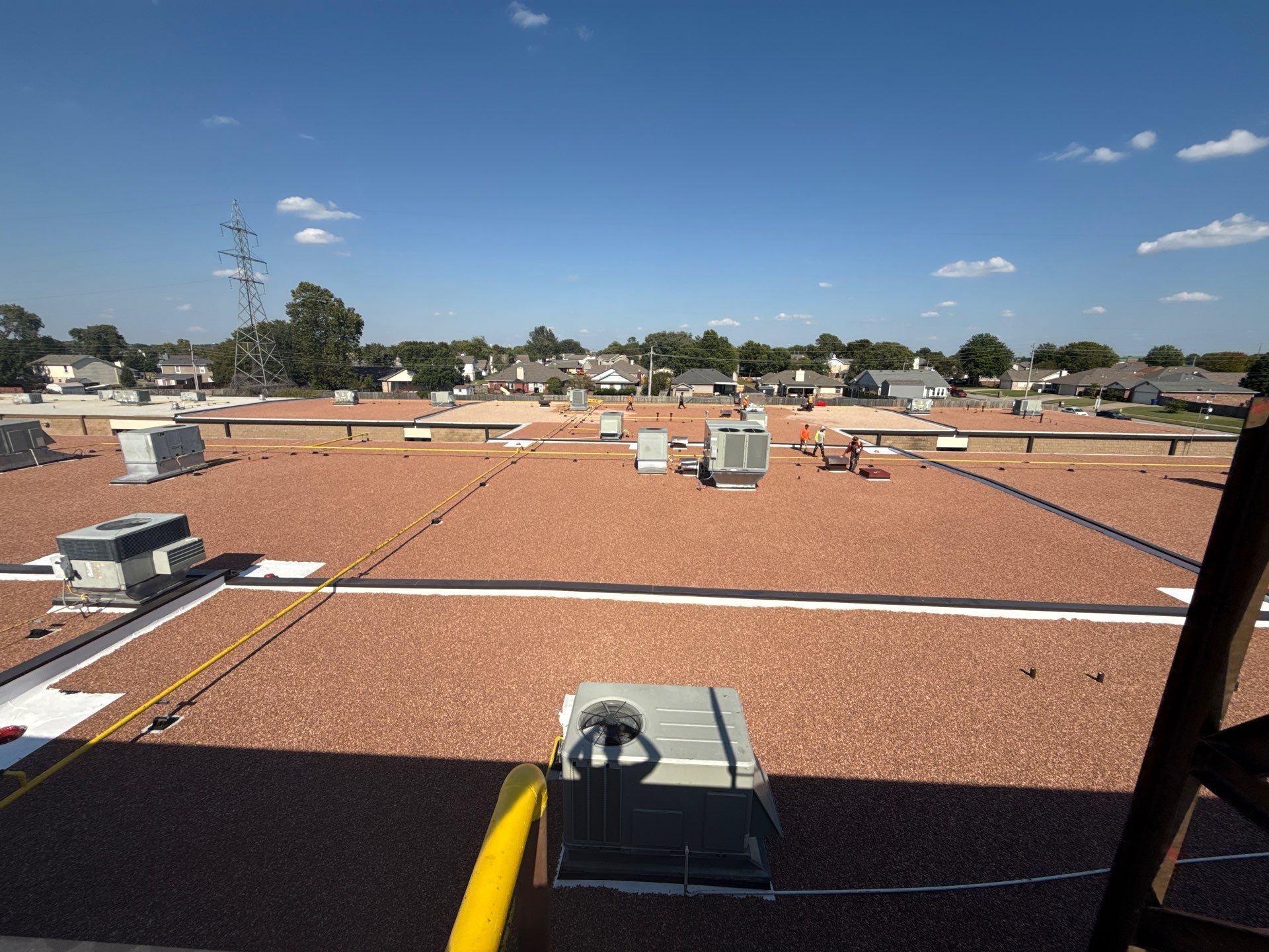 Mills Elementary School Commercial Re-Roof and Moisture Protection by Secondary Rhodes