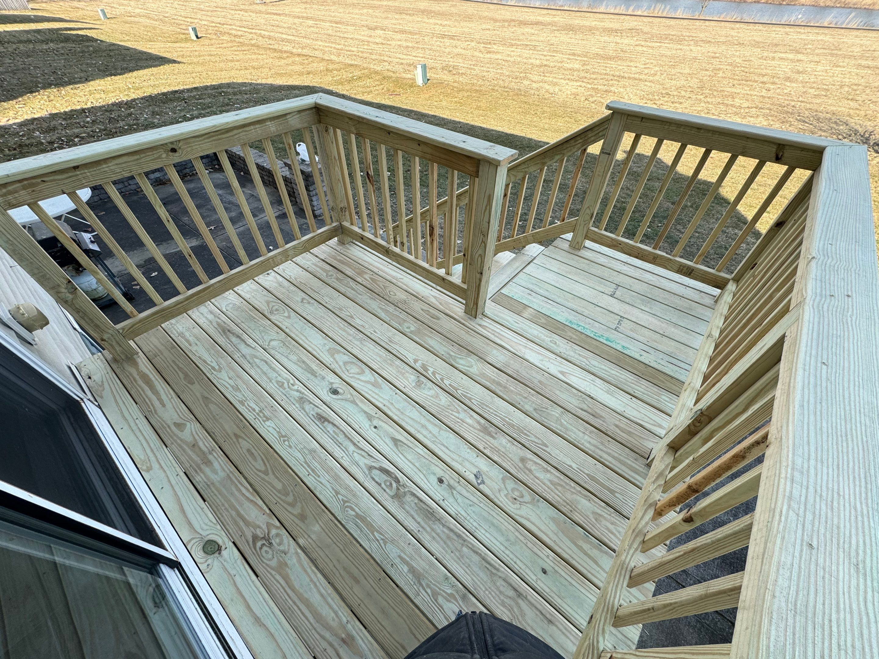 Deck Resurface with Treated SYP by Two Brothers Residential Maintenance