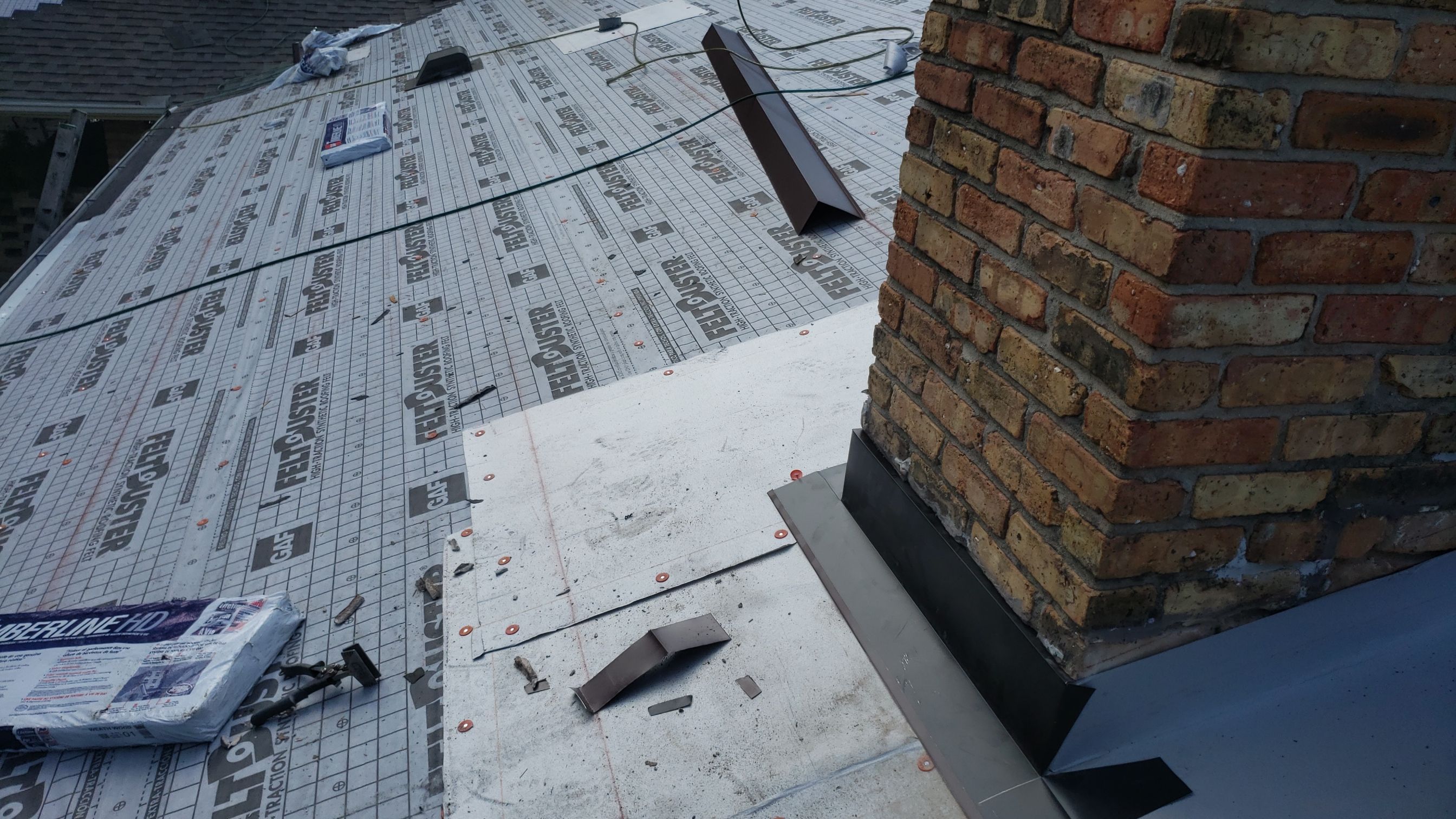 Residential Roofing Installation using Roof Replacement by American Roofing & Construction LLC