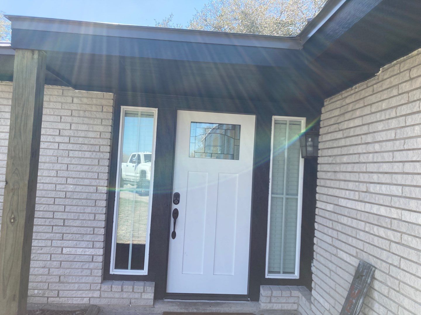 Beeville Backporch sittin' by Bayfront Roofing and Construction