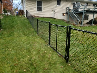Residential Black Vinyl-Coated Chain Link Fence in Grundy Center