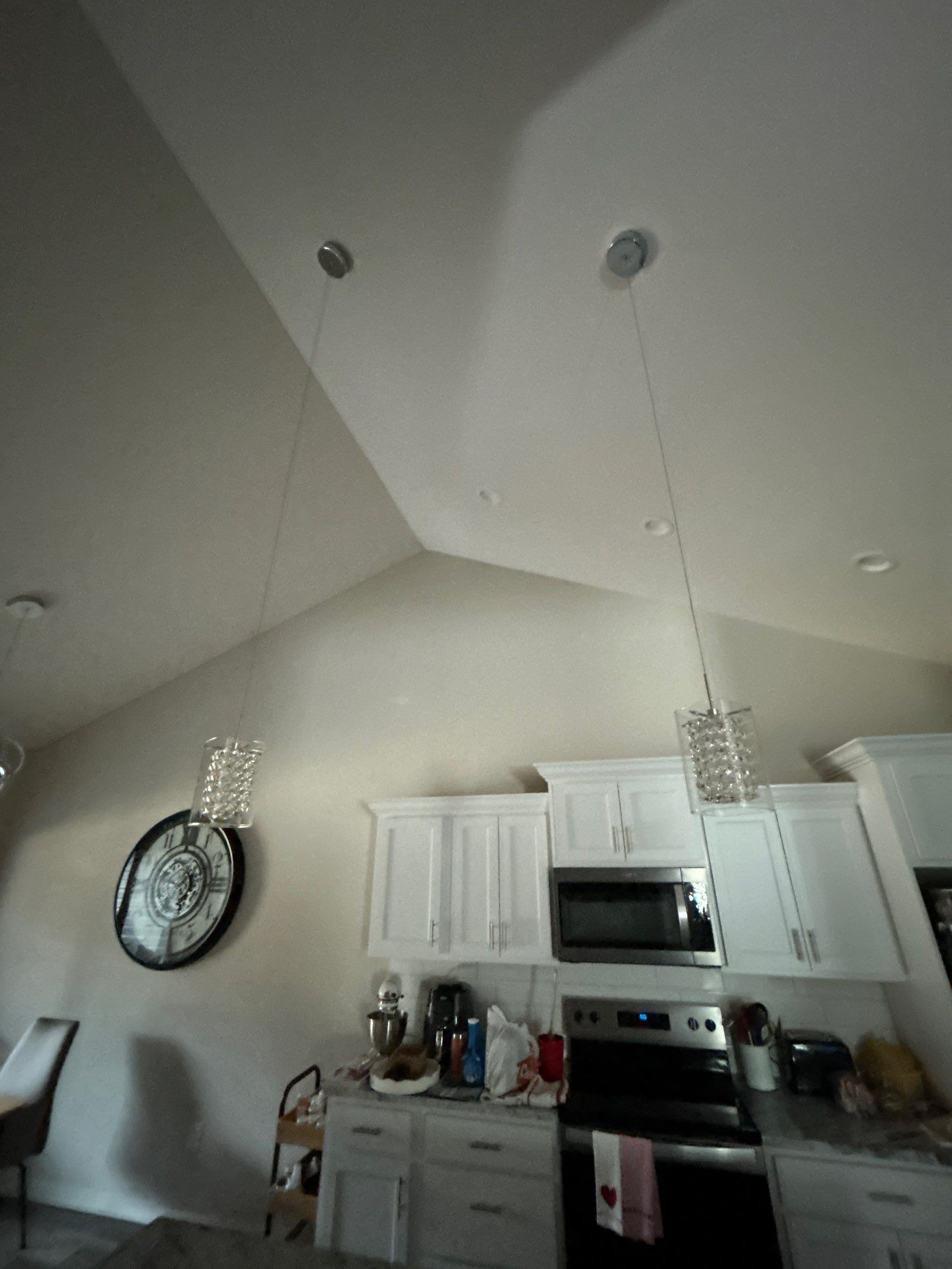 Replacing Light Fixtures in Dining & Kitchen by Bear Electric