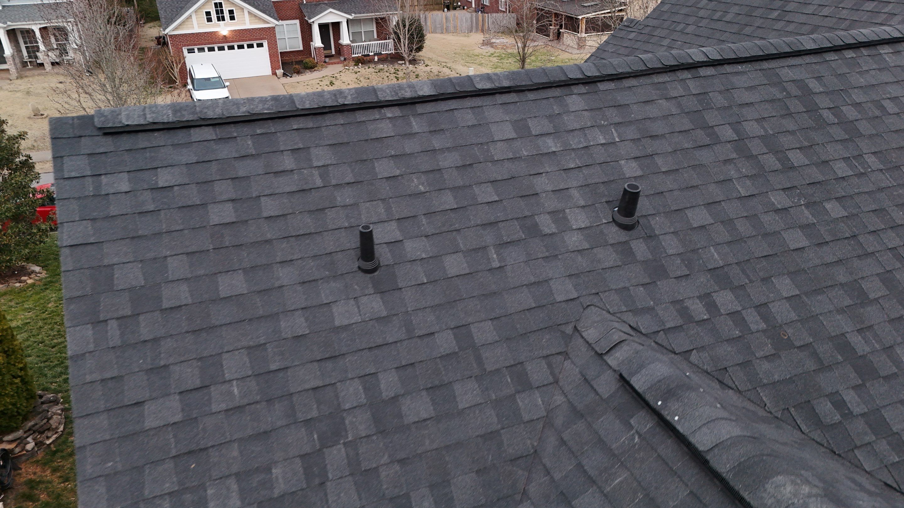 Charcoal Black Re-Roof by Royal House LLC