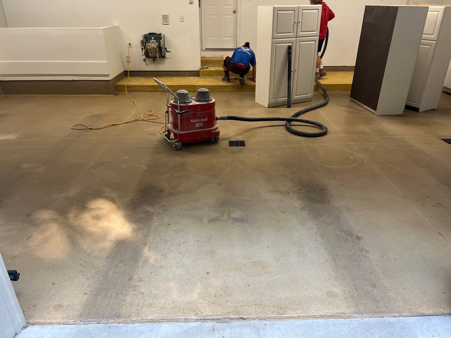 Exterior Siding Repairs and Epoxy Flake Floor in Spring Lake by Gordon Painting
