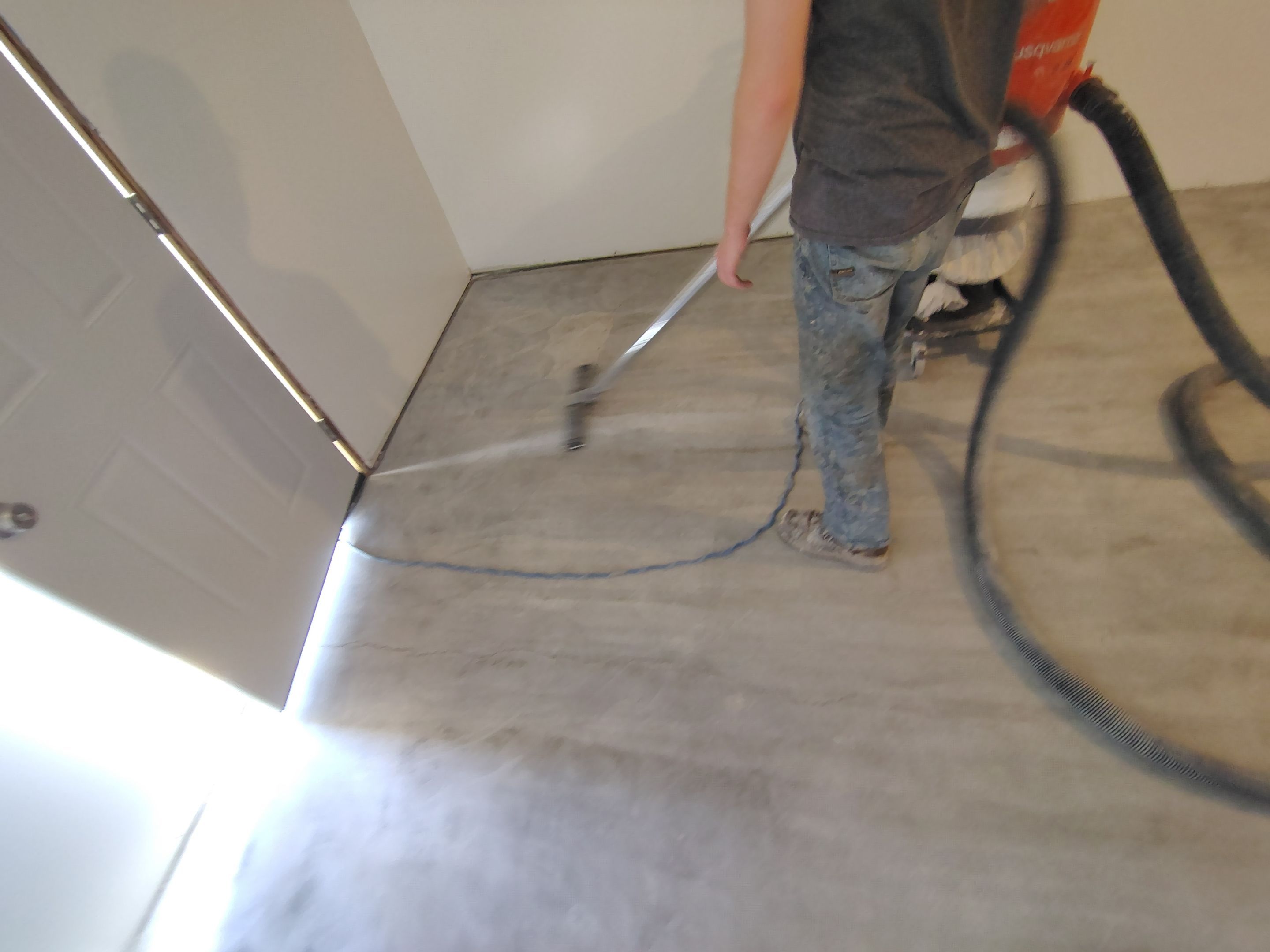 Decorative Chip Concrete Coating Installation in Luverne by Select Painting, Coatings & Garage Cabinets