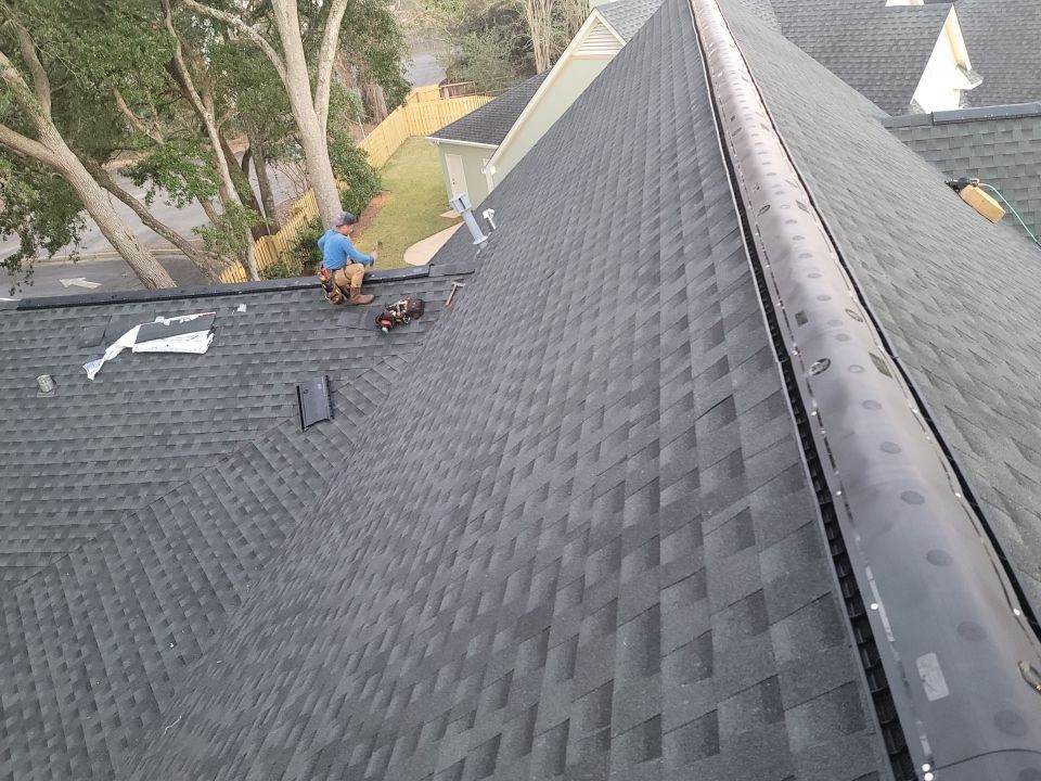 Residential Roofing Installation using Roof Replacement by American Roofing & Construction LLC