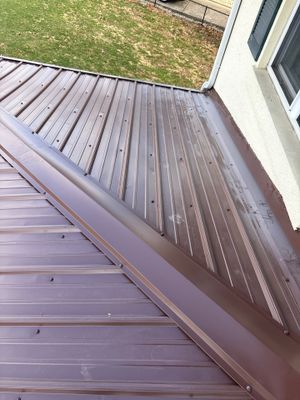 Residential Roofing Installation using Metal
